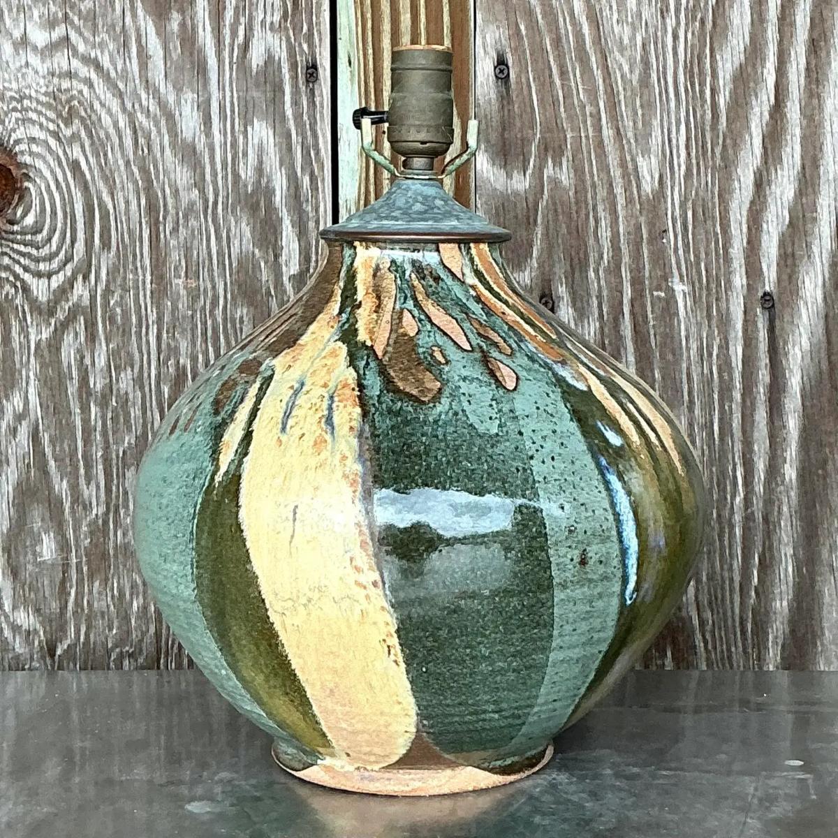 Vintage Boho Glazed Ceramic Lamp – A beautifully crafted piece with a bohemian touch. Featuring a rich, textured glaze and earthy tones, this lamp adds warmth and artistic flair to any room, perfect for creating a cozy, eclectic atmosphere.