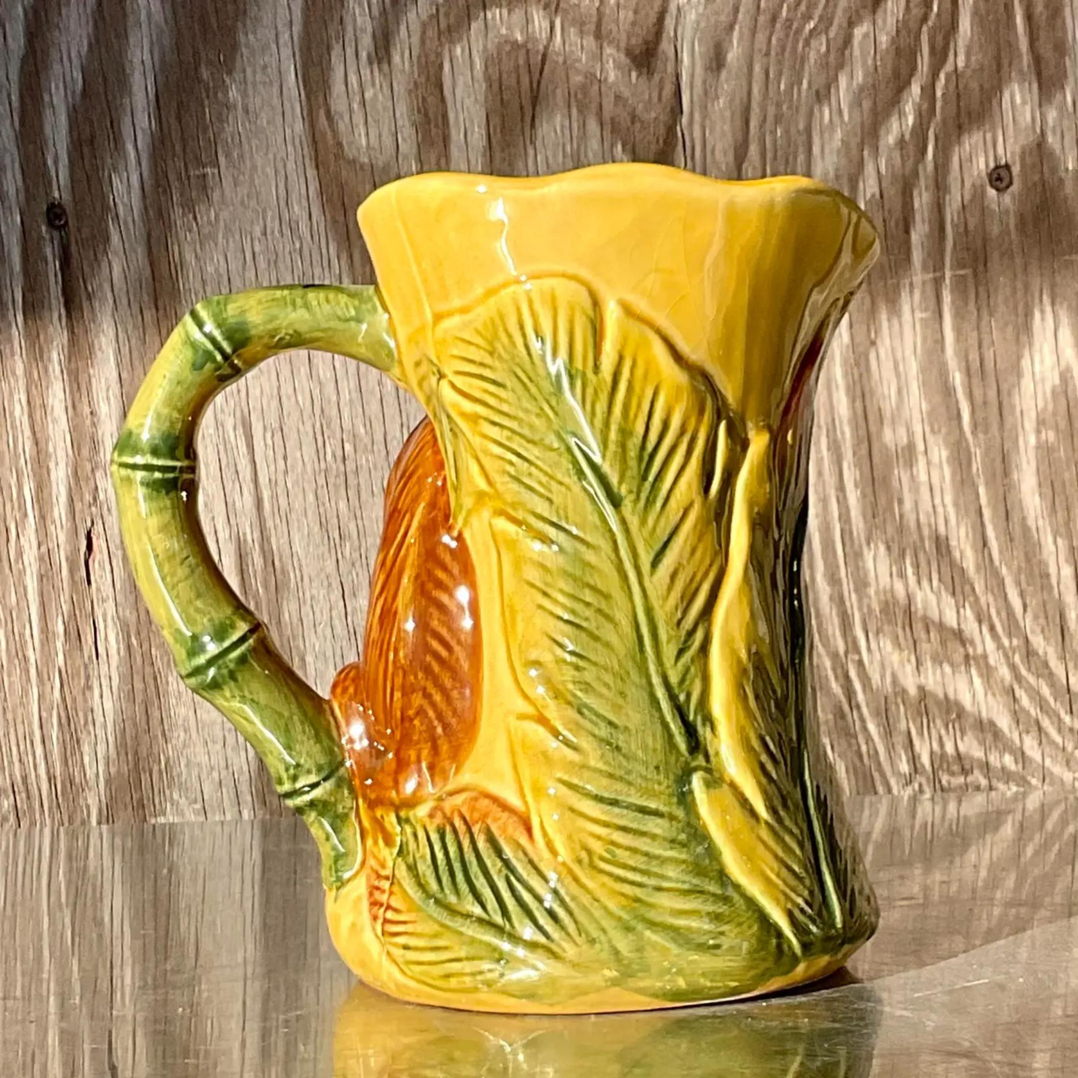 A fabulous vintage Boho pitcher. A charming monkey among the leaves. Perfect for water, sangria or even a tropical martini pitcher. You decide! Acquired from a Palm Beach estate