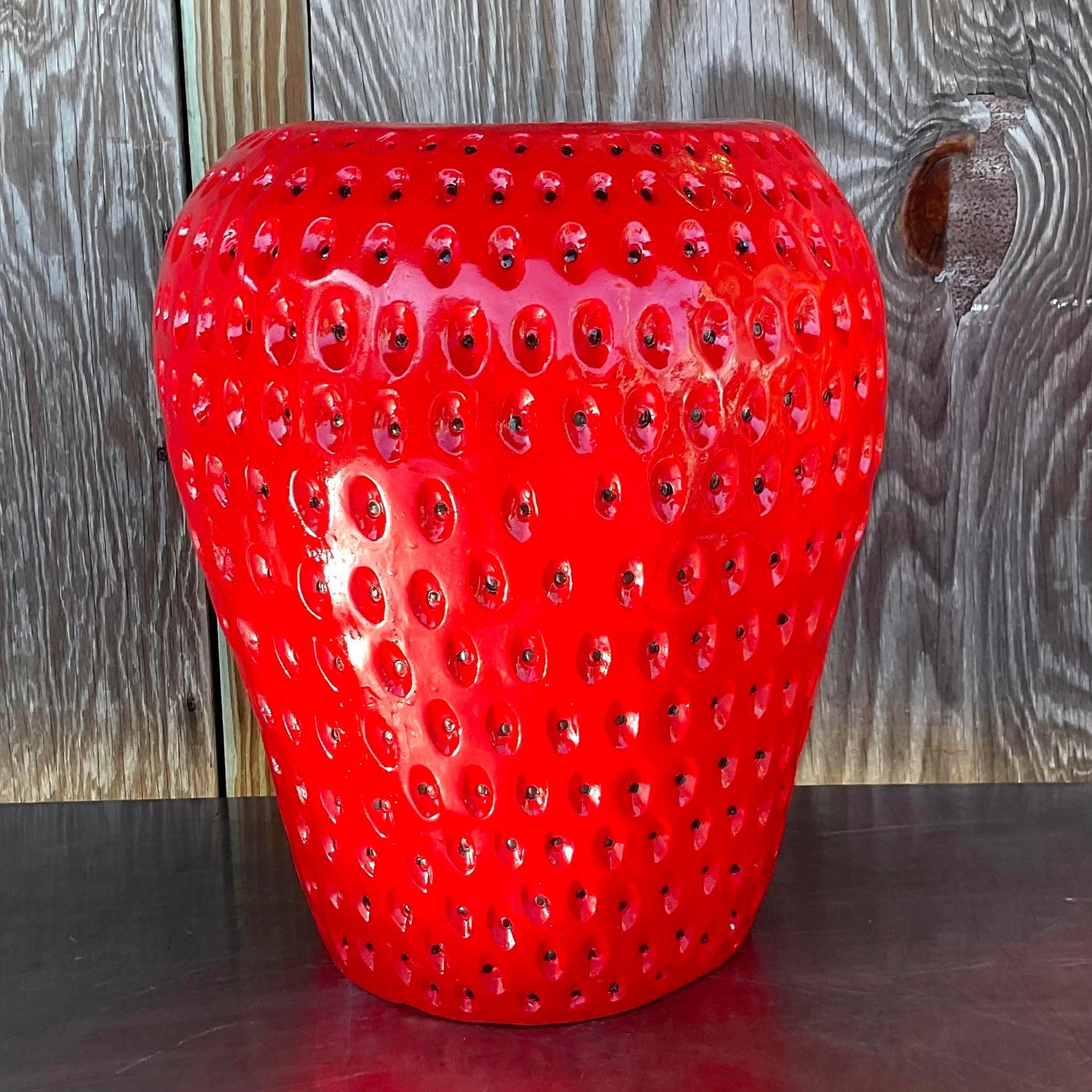 A fabulous vintage Boho low stool. A great big strawberry with incredible attention to detail. A glazed ceramic finish on a brightly colored paint. Coordinating stools also available on my page. Acquired from a Palm Beach estate.