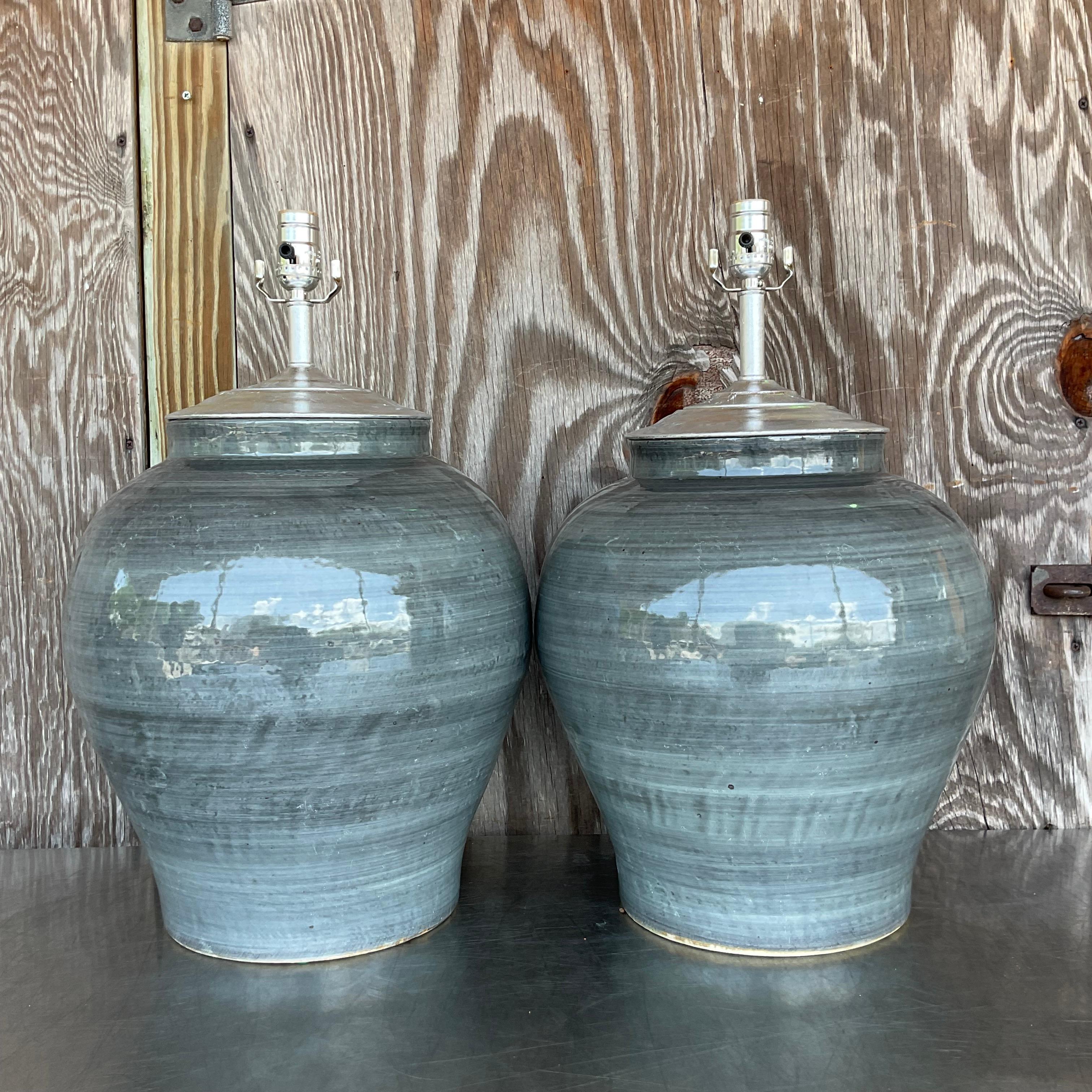 Illuminate your home with our Vintage Boho Glazed Ceramic Table Lamps. Sold as a pair, these American-curated lamps showcase boho-inspired design, featuring beautifully glazed ceramic bases that bring warmth and artistic flair to your living space