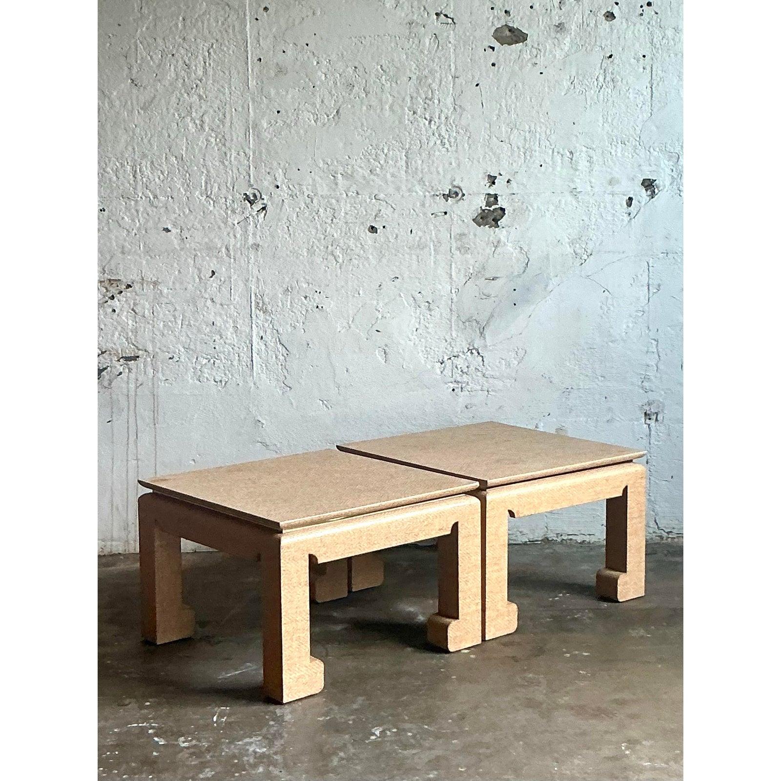Introduce a layer of sophisticated, organic texture to your interior with this exceptional pair of vintage Parsons-style side tables. Fully wrapped in a finely woven grasscloth, each table features a beautiful herringbone pattern that adds tactile