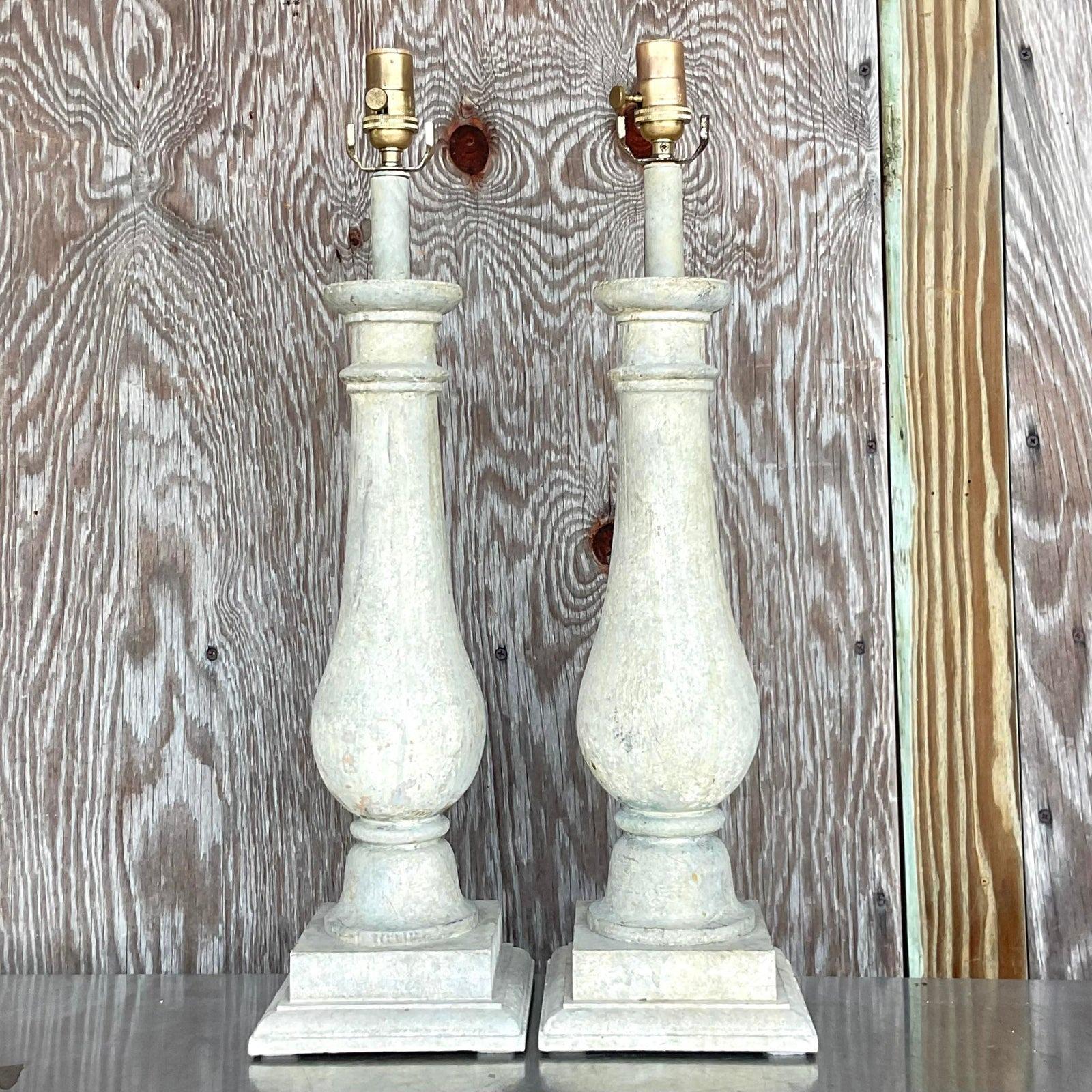 A spectacular pair of vintage Boho table lamps. Made by the iconic Gusto group in Palm Beach. Beautiful wood balustrade shape with a chic patinated finish. Acquired from a Palm Beach estate.