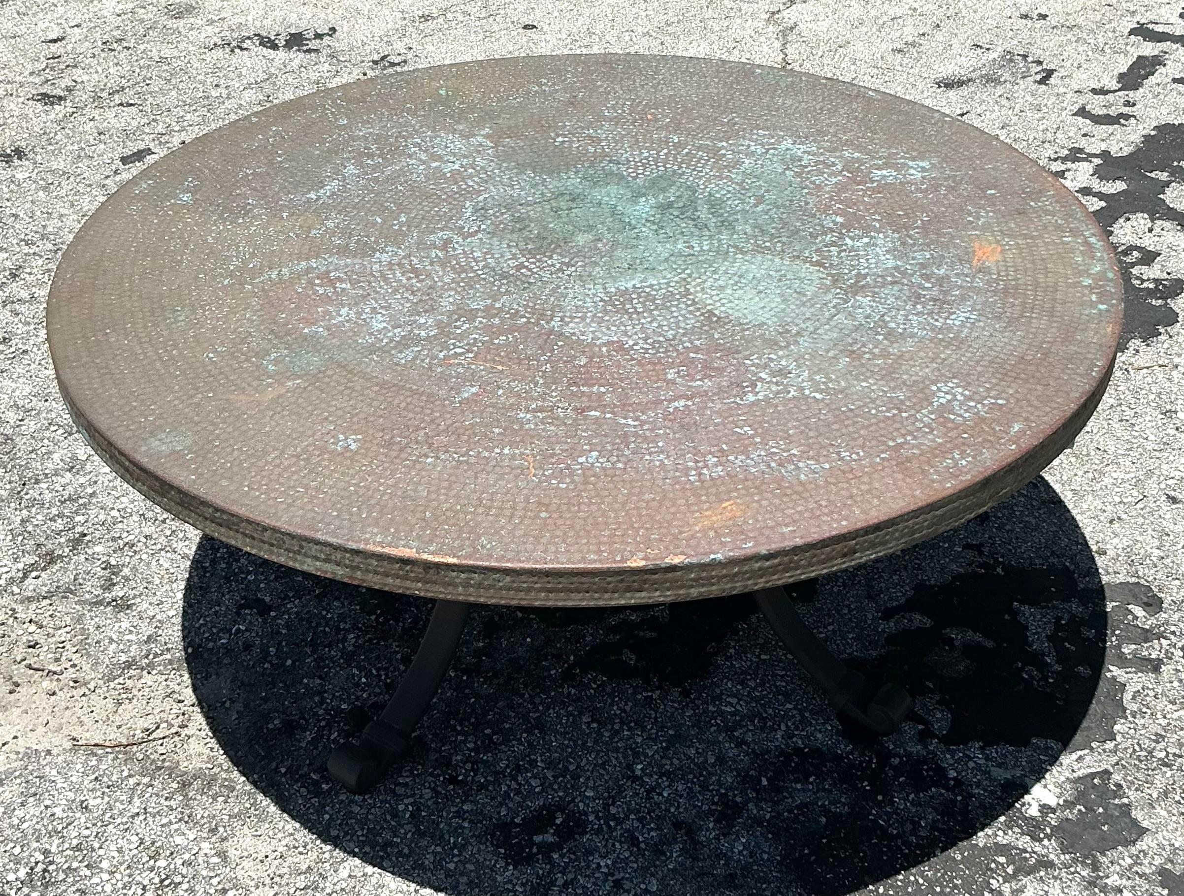 Introduce eclectic elegance to your living space with our American-style Vintage Boho Hammered Copper Coffee Table. Featuring a beautifully textured hammered copper surface, this table blends vintage charm with bohemian flair, creating a stunning