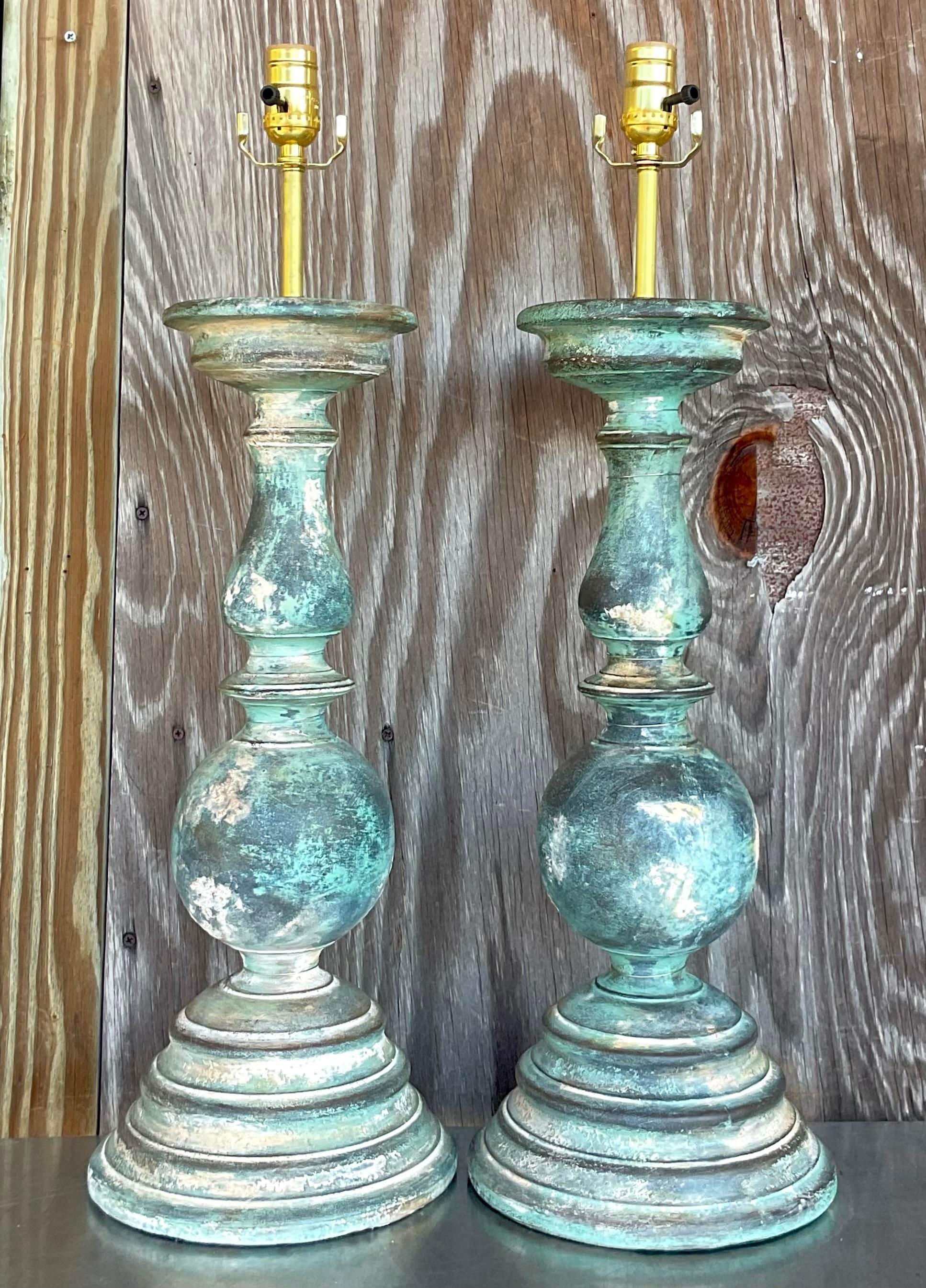 Enhance your home's ambiance with this stunning pair of vintage hand-painted balustrade lamps. Infused with American craftsmanship and charm, each lamp exudes a unique blend of artistic flair and classic elegance. Elevate your decor with these