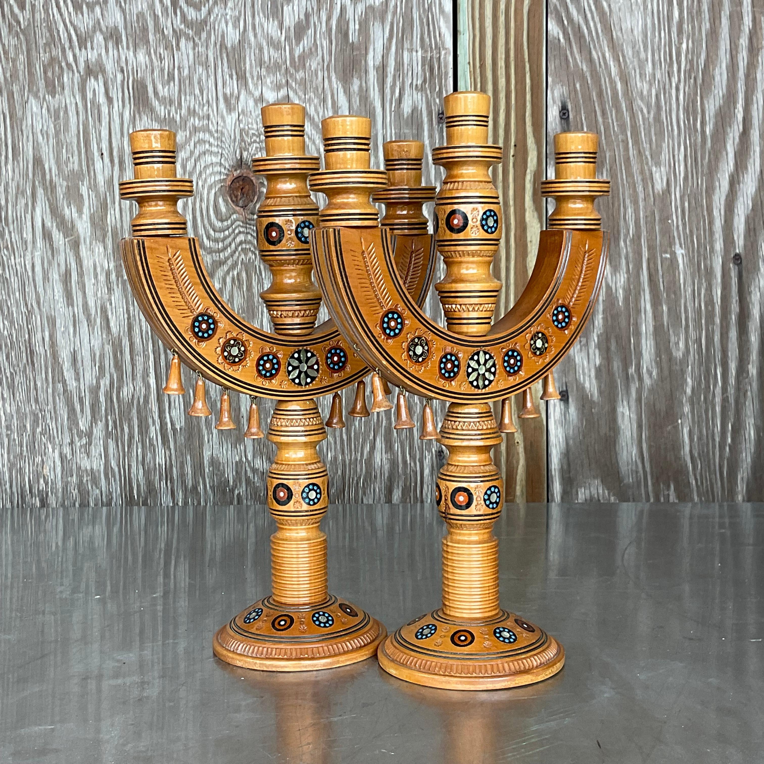 A fabulous pair of vintage Boho Candelabras. Chic hand painted detail on a milled Burl wood frame. Acquired from a Palm Beach estate.