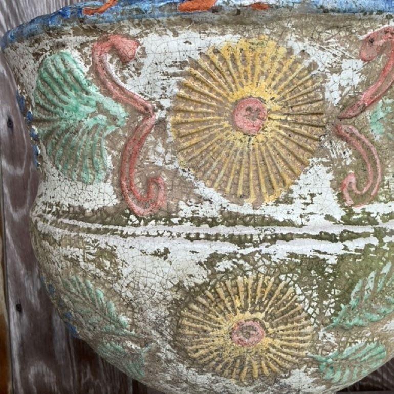 Bring artistic charm to your outdoor space with these Vintage Boho Hand-Painted Cast Concrete planters. Perfect for American-style exteriors, these urns feature intricate hand-painted designs that blend vibrant colors with Boho elegance. Their