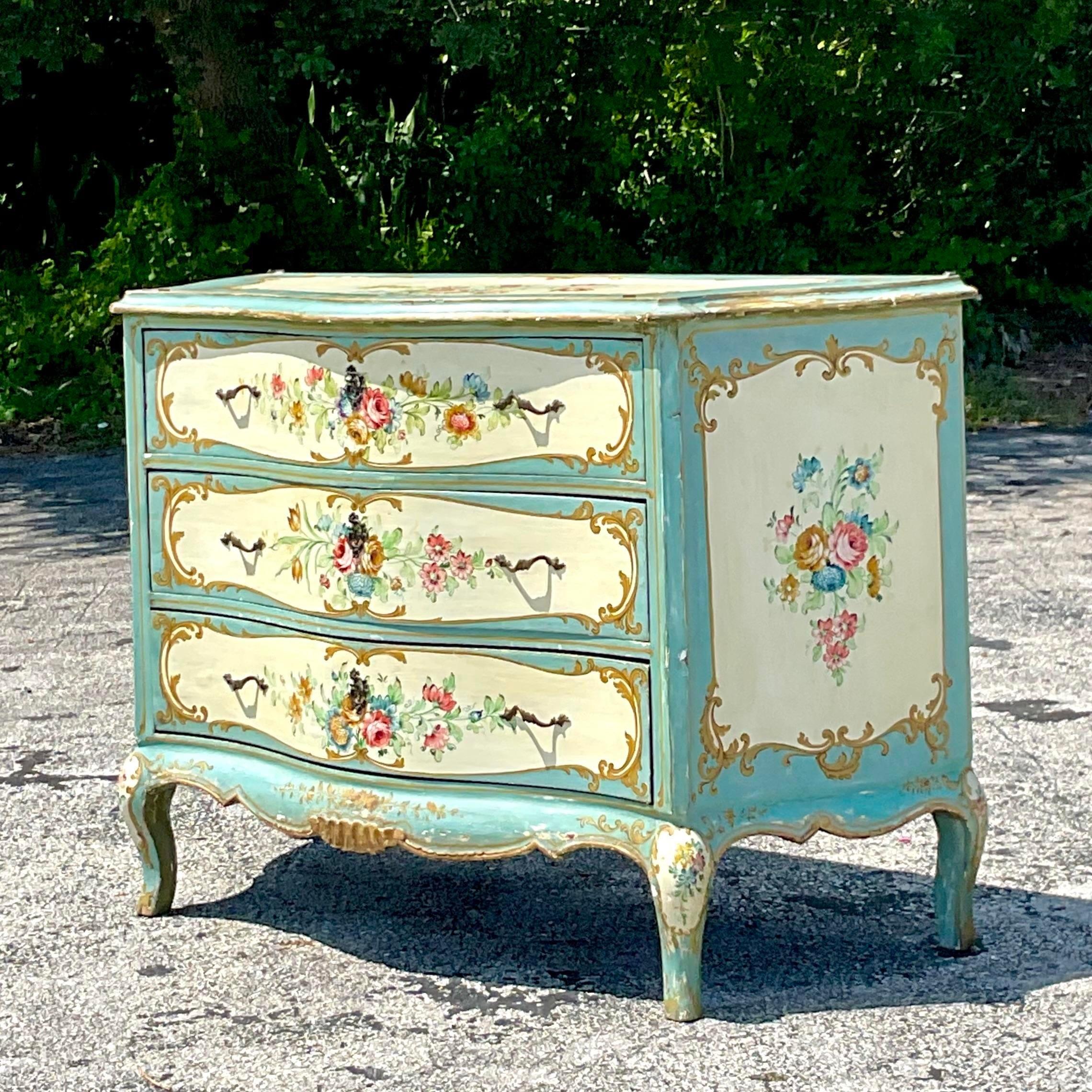A exceptional vintage Boho dresser. Incredible hand painted detail. Brightly colored flowers with gilt flourishes. Coordinating pieces also available on my  page. Acquired from a RI estate.