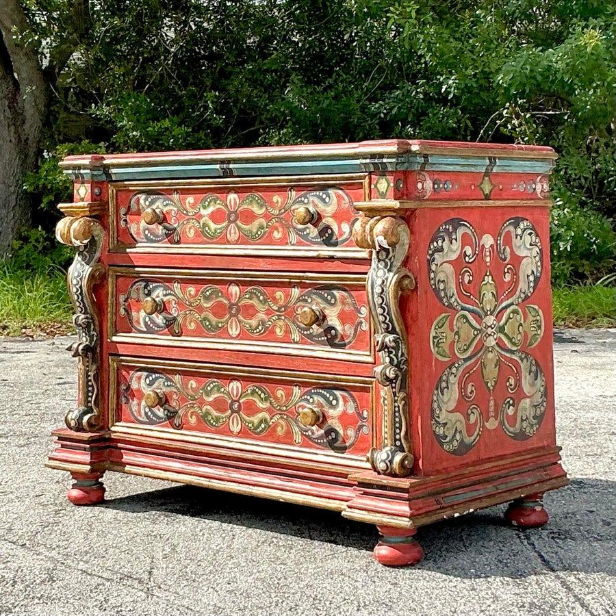Ajoutez une touche de charme fantaisiste et de style éclectique à votre espace avec cette commode vintage Gypsy Wagon peinte à la main. Inspirée par l'art vibrant de la culture bohème, cette pièce unique est ornée de motifs complexes et de couleurs