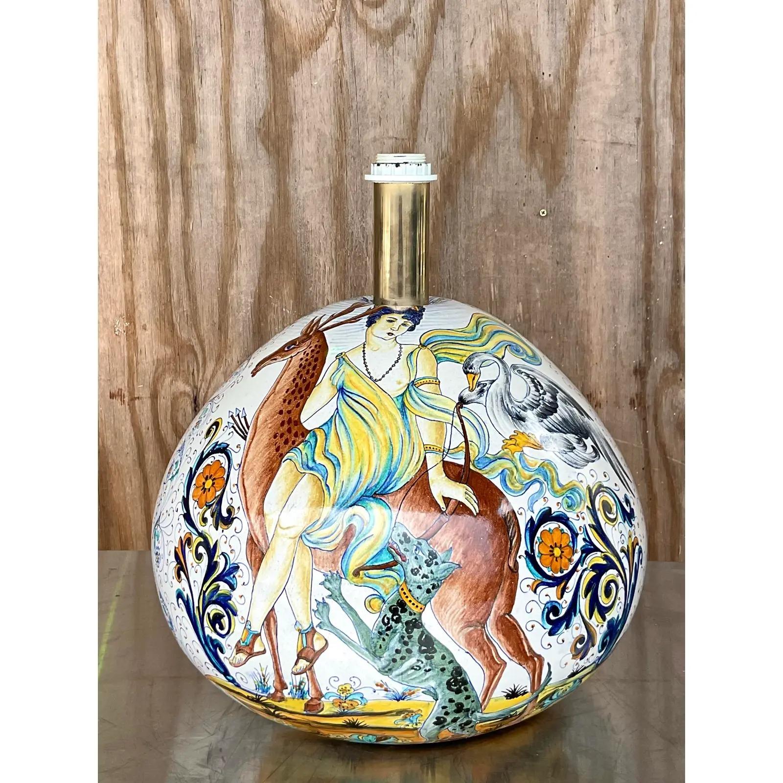 Gorgeous vintage large glazed ceramic lamp. Hand painted composition of a beautiful woman surrounded by her forest friends. Bright clear colors. Acquired from a Palm Beach estate.