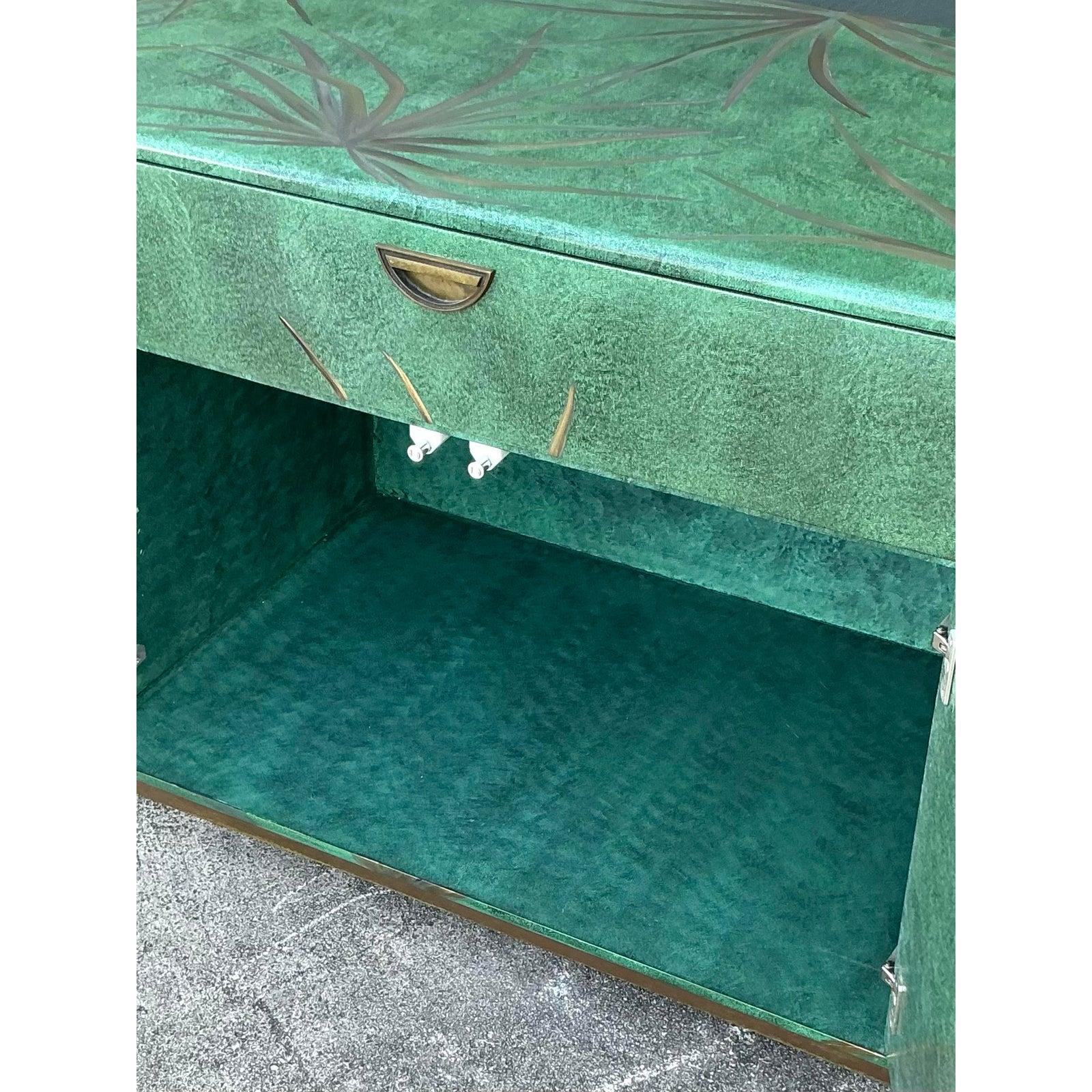 Transport your interiors to a lush tropical paradise with this spectacular two-piece vintage furniture set. Comprising a four-drawer chest and a matching dry bar cabinet, this duo is defined by a bold Postmodern silhouette featuring sleek, chamfered