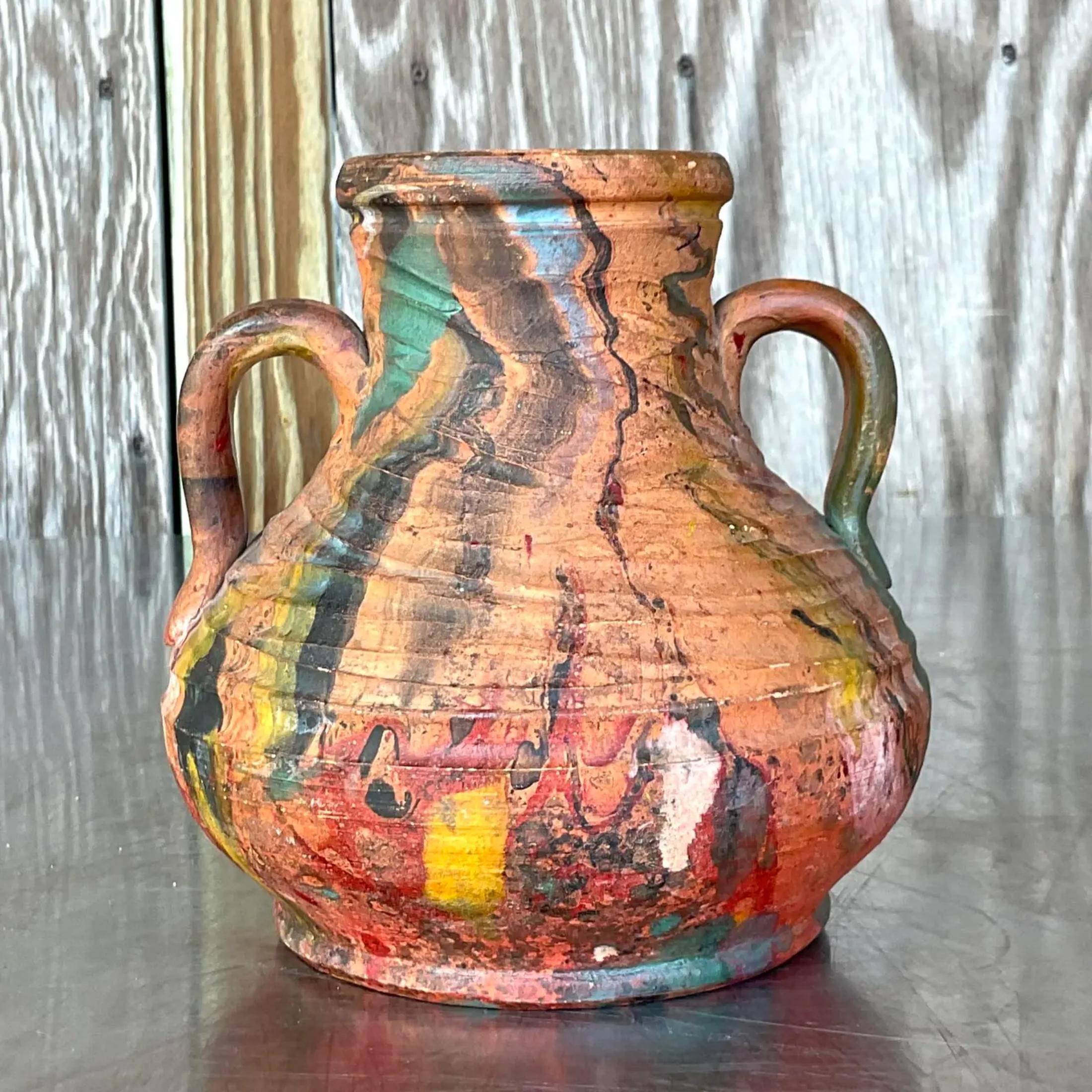 A fabulous vintage Boho Pottery vase. Fantastic hand painted detail on a matte finish. Acquired from a Palm Beach estate.