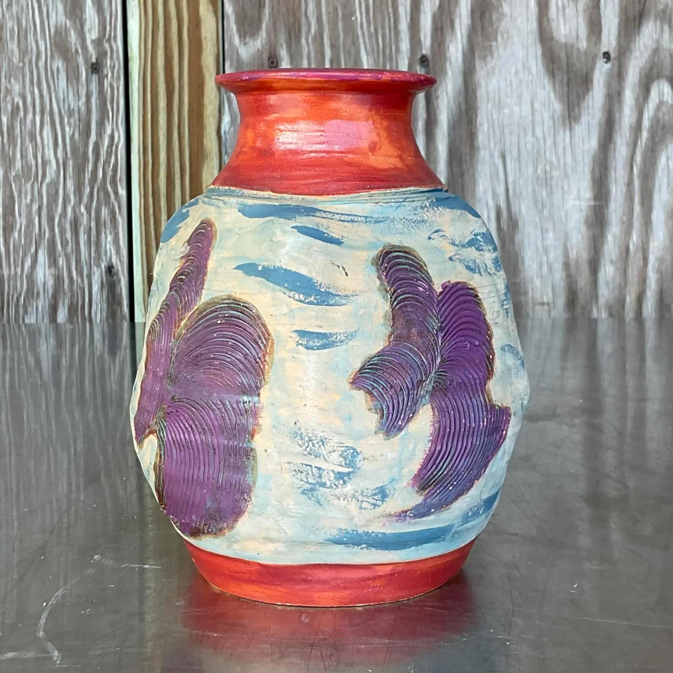 A fabulous vintage Boho studio pottery vase. A chic little work with brightly colored hand painted detail. Acquired from a Palm Beach estate