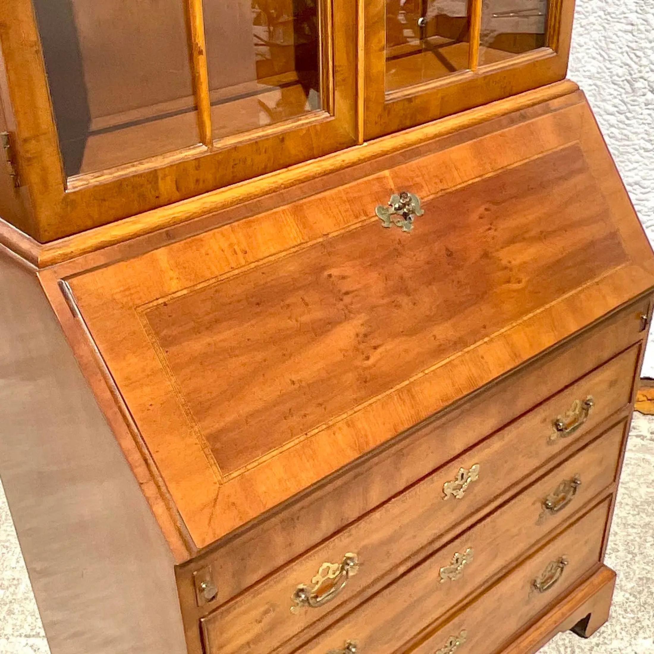 A chic vintage Boho secretary desk. Made by the iconic Henredon group. Part of their Folio 14 collection. Beautiful double arch design with beautiful wood grain detail. Acquired from a Palm Beach estate