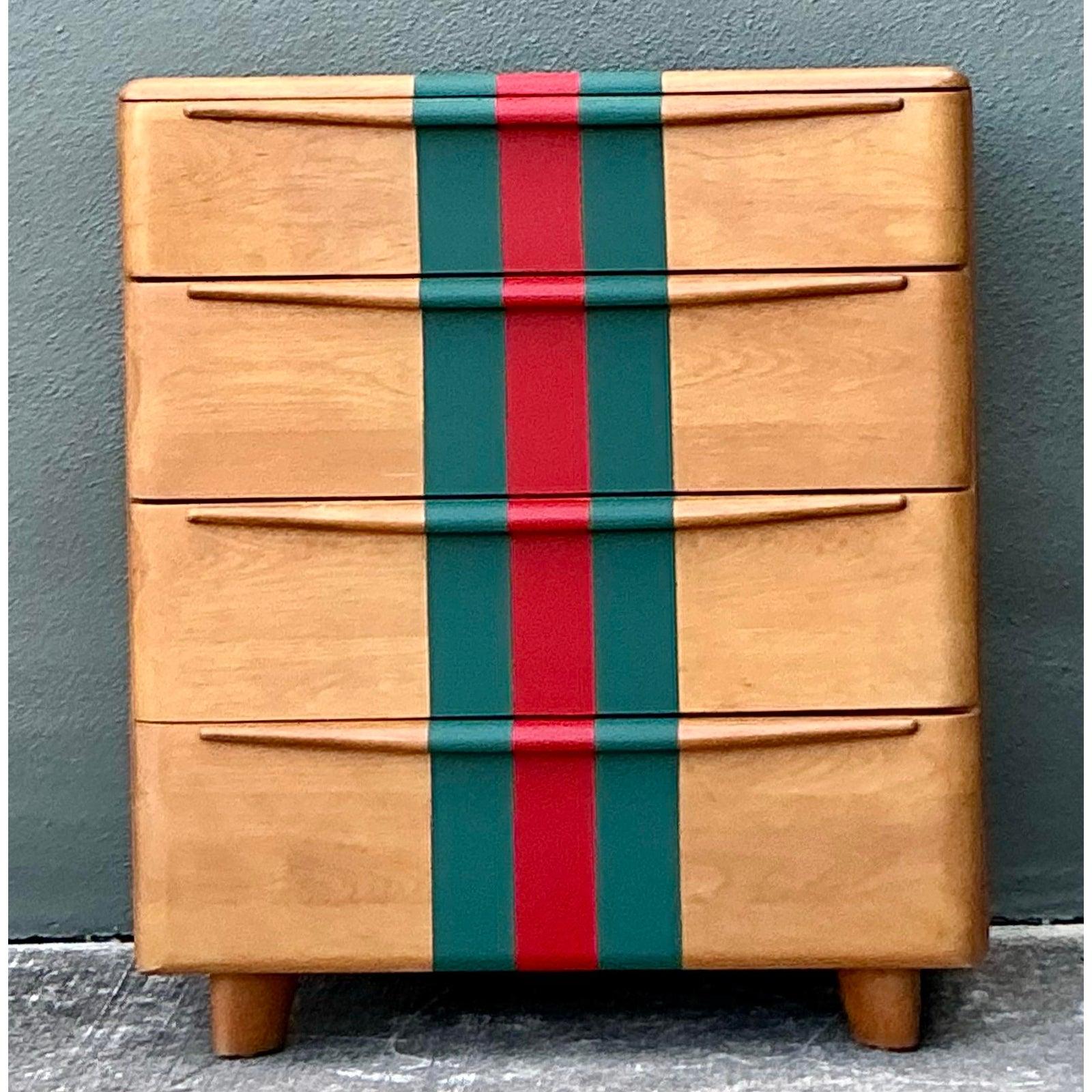 Make a bold style statement with this vintage Heywood Wakefield 4-drawer chest, brilliantly customized with a high-fashion twist. Known for their quality mid-century craftsmanship, this solid birch dresser retains its original warm 