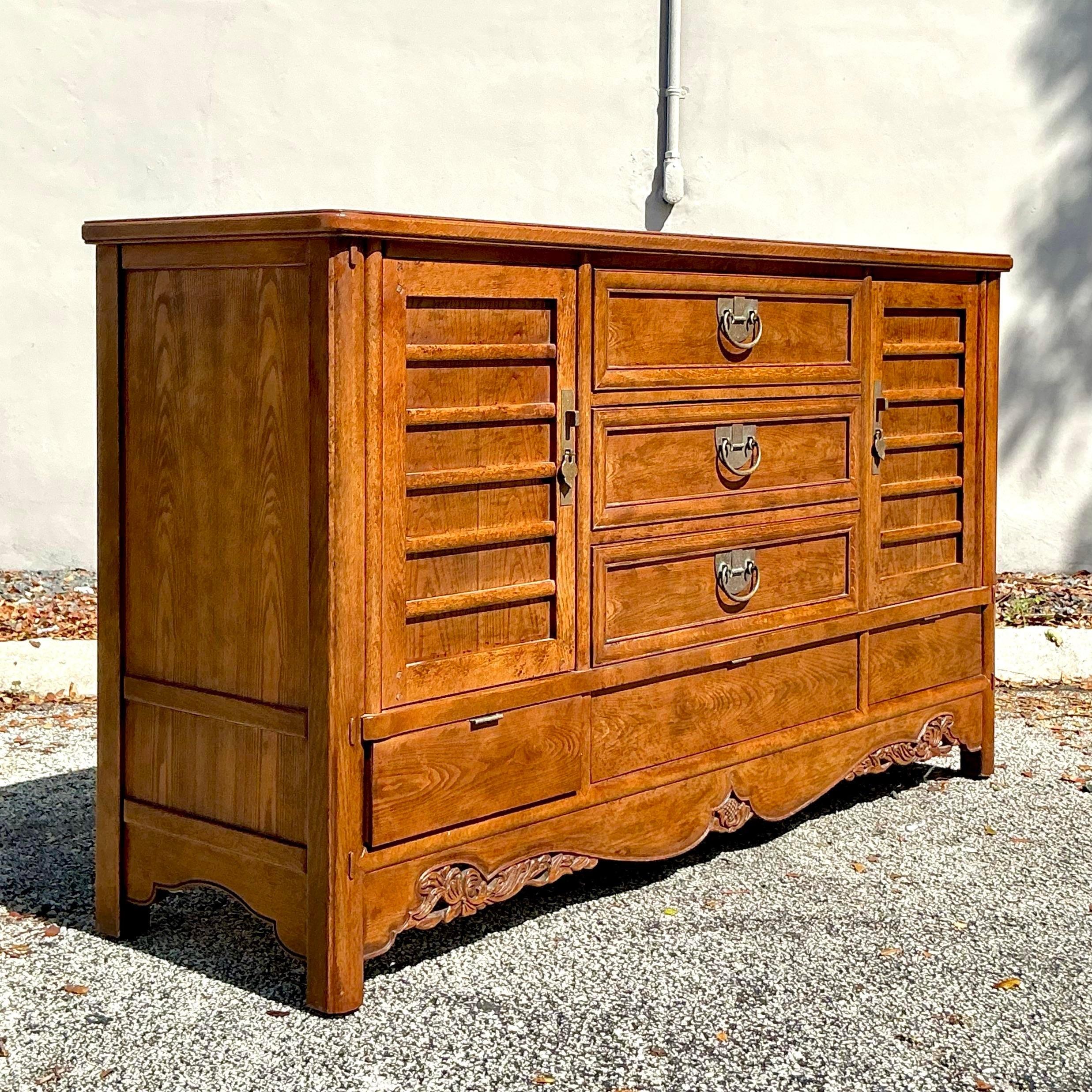 Bring a blend of vintage sophistication and boho charm to your space with this Vintage Boho Hickory White Credenza. Crafted with the exceptional quality Hickory White is known for, this credenza features beautiful wood grain detailing and subtle