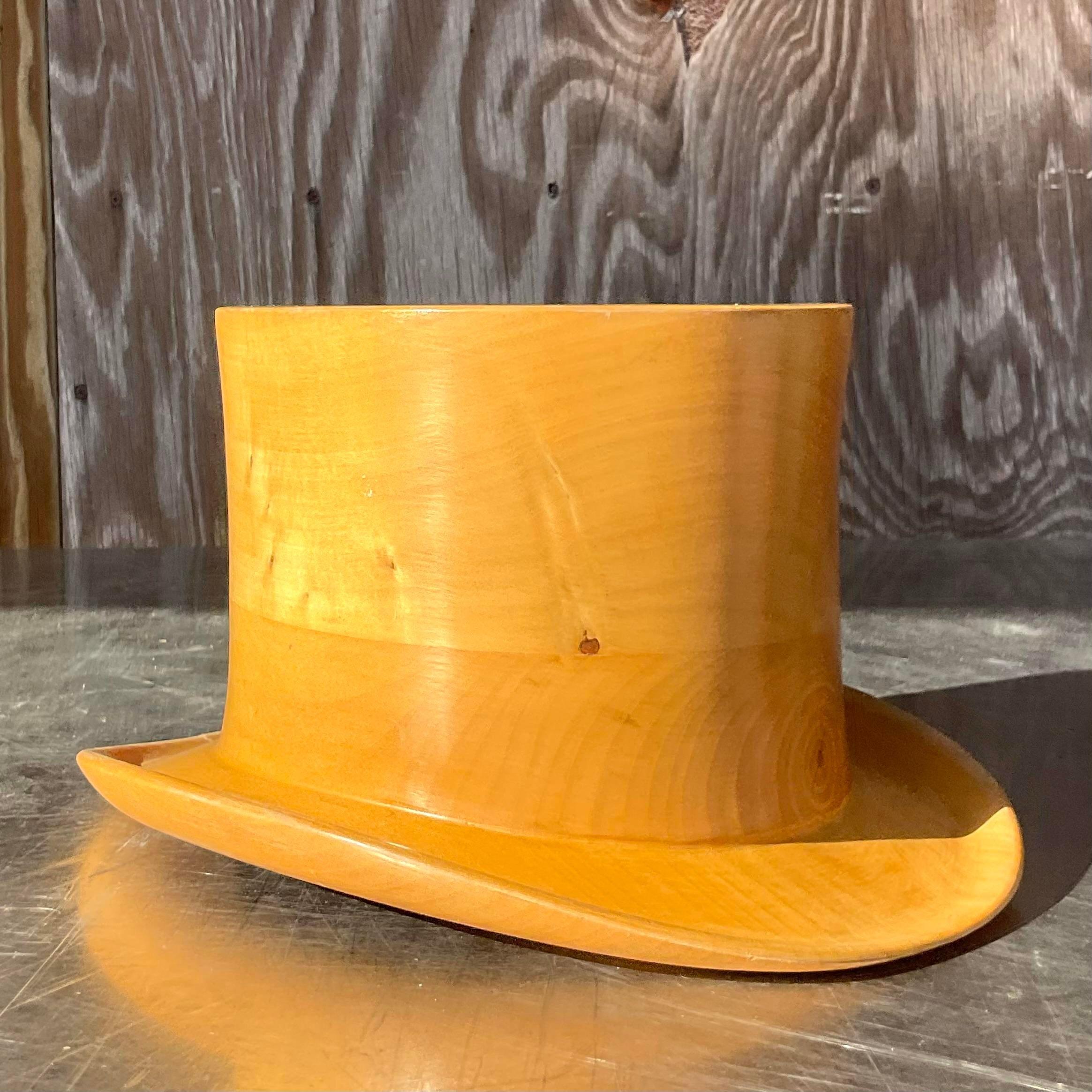 A fabulous vintage Boho wooden top hat. A chic hand tooled wood with beautiful wood grain detail. Made in Italy and marked inside. Acquired from a Palm Beach estate.