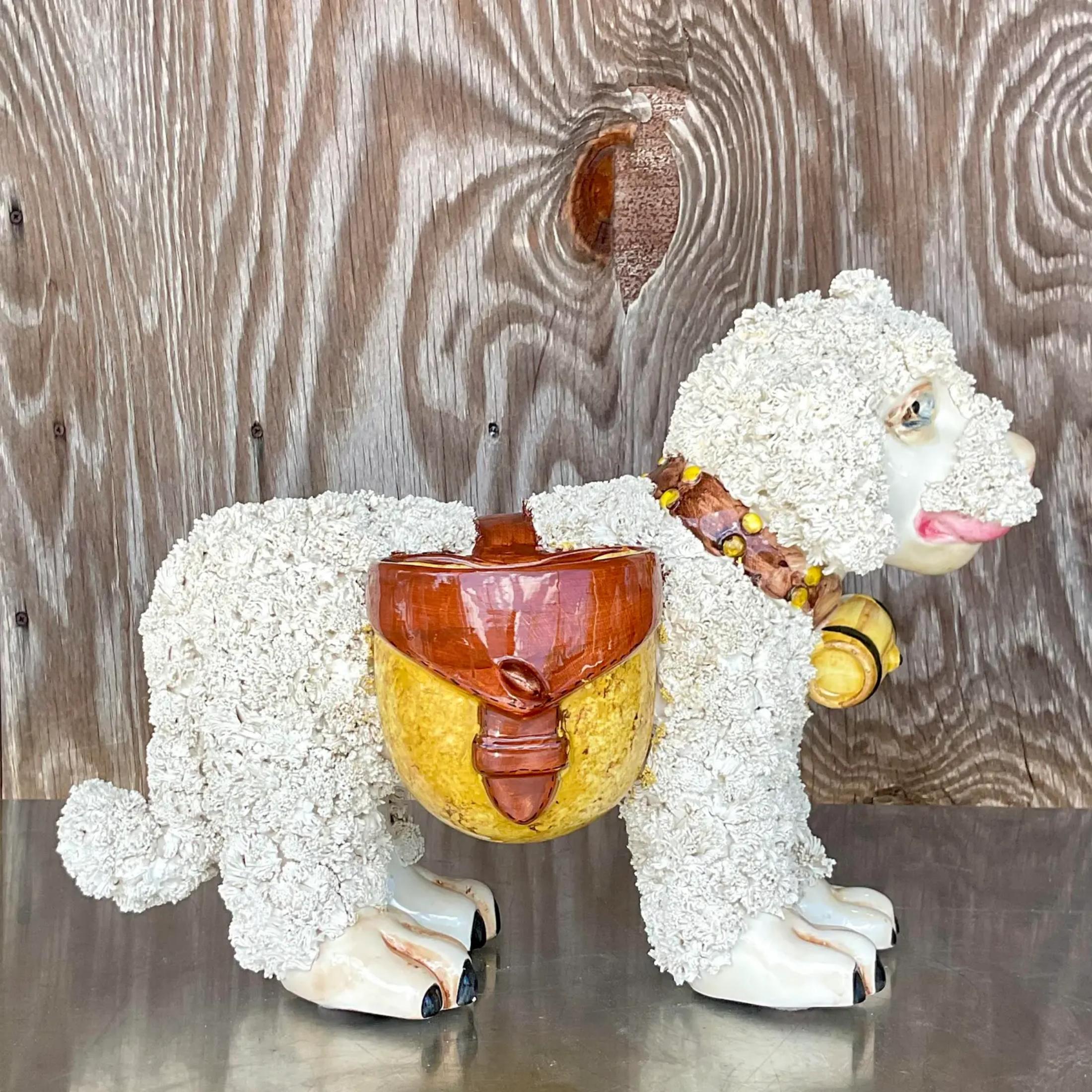 A fabulous set of two vintage Boho dogs. Made in Italy. Lots of beautiful detail and rich warm colors. Perfect as is or fill the baskets with shells or small orchids. You decide! Acquired from a Palm Beach estate
