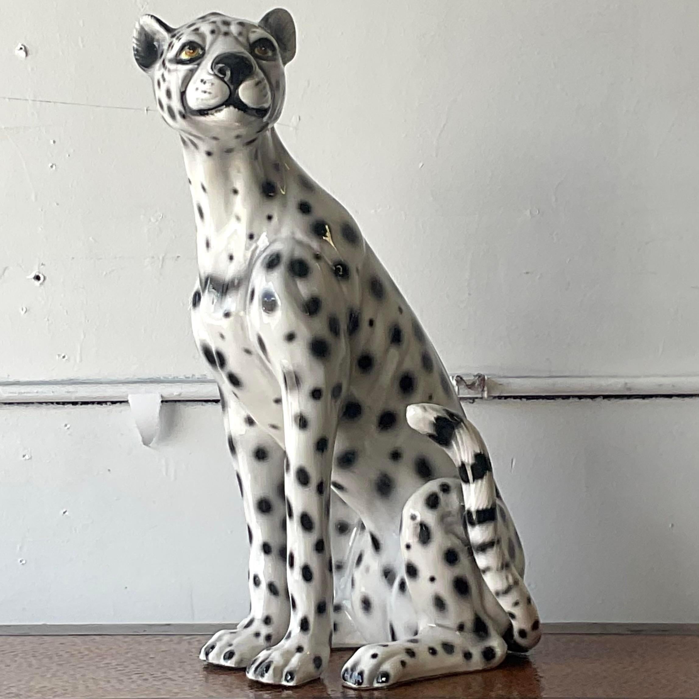 A stunning vintage Boho glazed ceramic cheetah. Beautifully hand painted in graphic black and white. Made in Italy. Acquired from a Palm Beach estate.