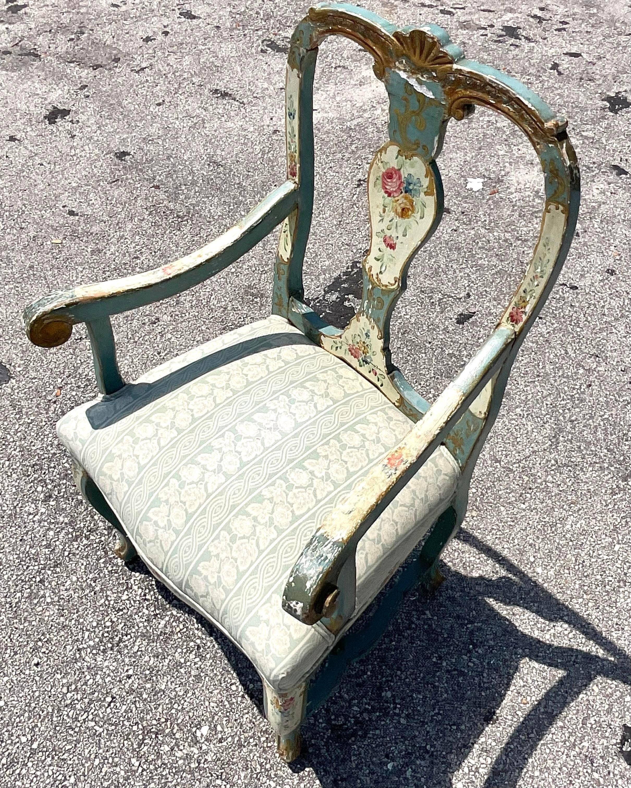 A fabulous vintage Boho arm chair. A chic Italian hand painted floral design. An all over patina from time that gives it a romantic look. Coordinating pieces also available on my Chairish page. Acquired from a Palm Beach estate.