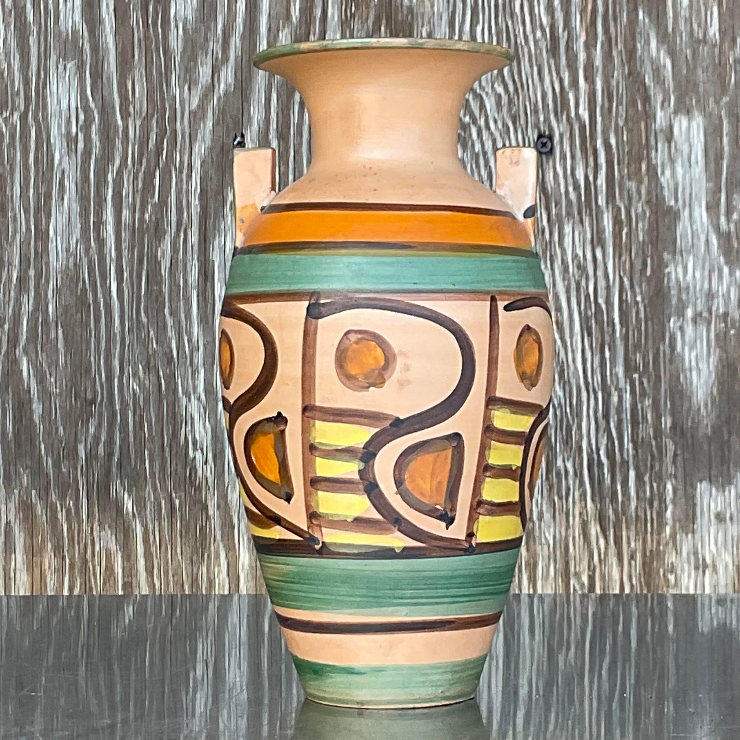 Fantastic vintage Italian ceramic vase. Beautifully hand painted in chic muted colors. Marked on the bottom. Acquired from a Palm Beach estate. 