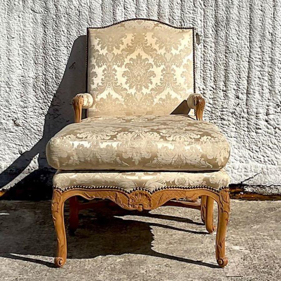 North American Vintage Boho Jacquard Fleur De Lys Nailhead Chair and Ottoman For Sale