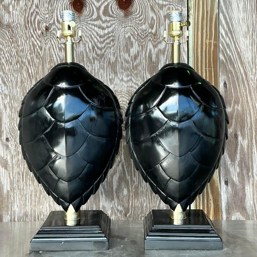 Bring a touch of bohemian elegance to your space with this pair of vintage lacquered turtle shell lamps. Featuring beautifully crafted turtle shell silhouettes with a glossy lacquer finish, these unique lamps exude natural charm and artistic appeal.