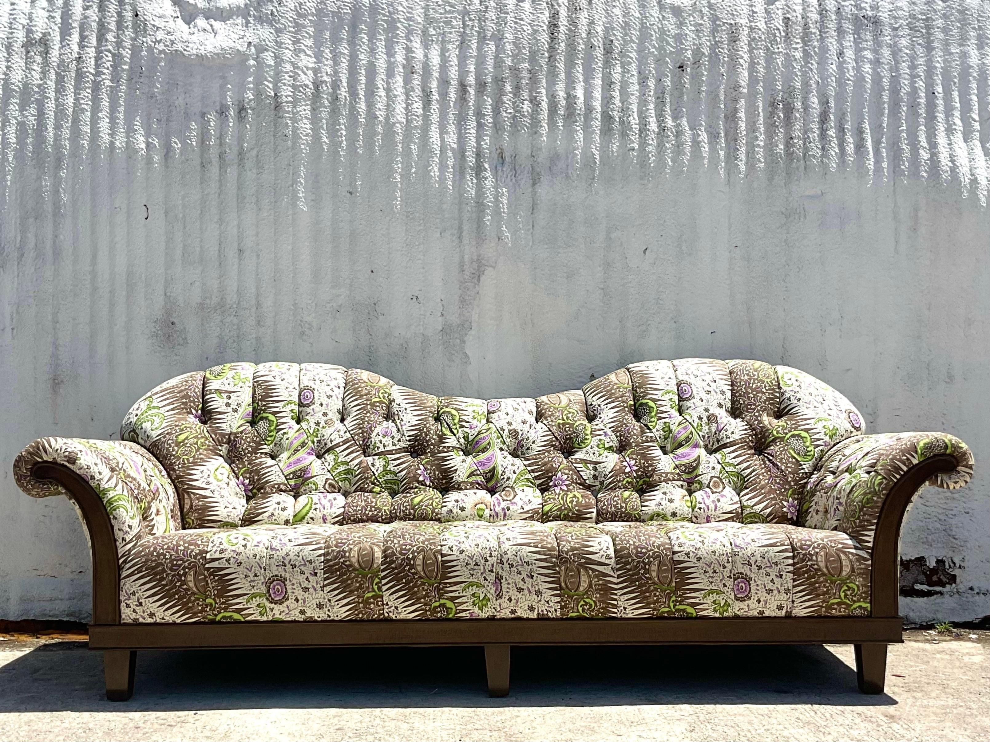 An extraordinary vintage Coastal roll arm sofa. Designed by Lori Deeds for the iconic Celerie Kemble. Upholstered in the stunning Quadrille “Les Indiennes”. Acquired from a Hobe Sound estate.