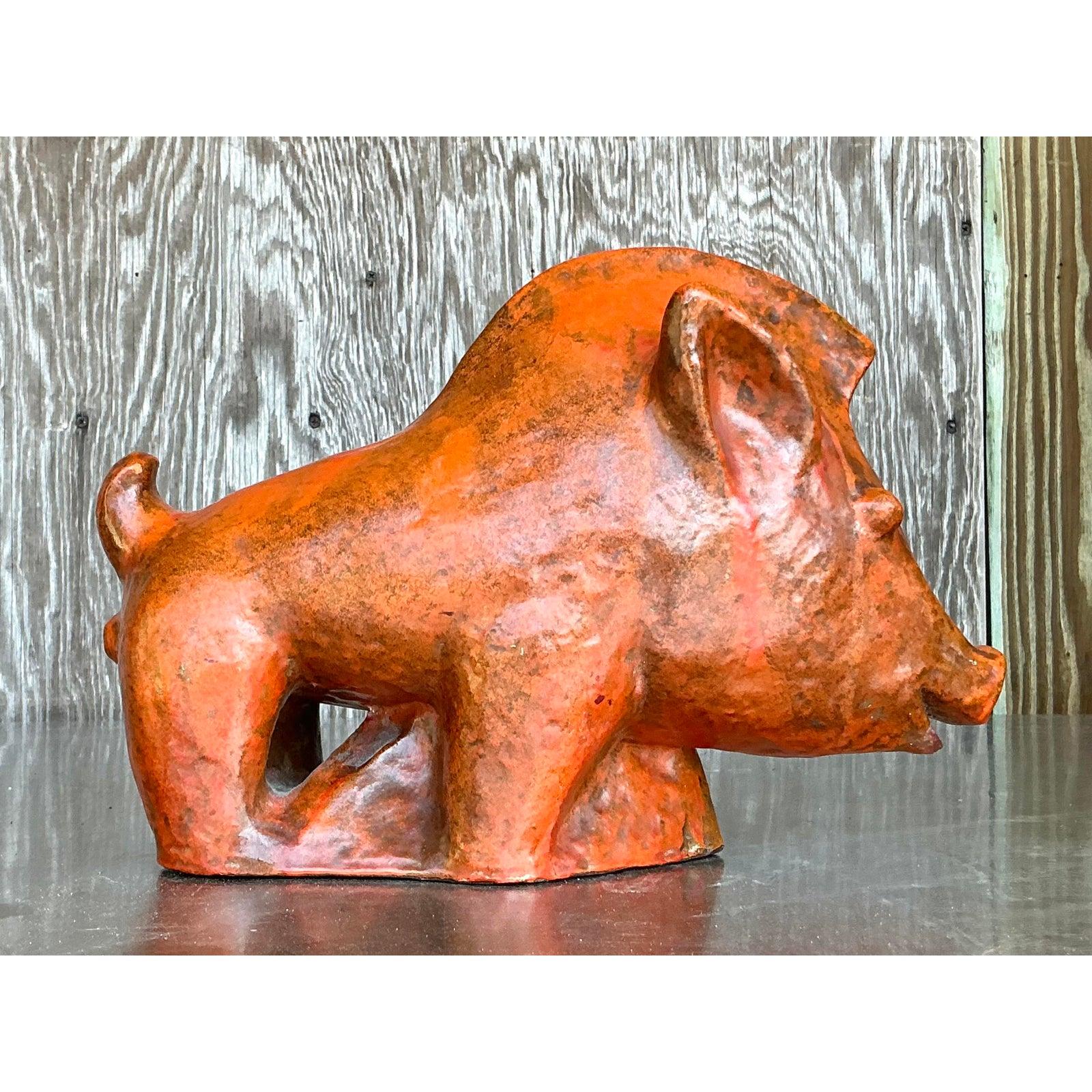 Add a whimsical yet artistic touch to your decor with this vintage Ludwig Konig glazed ceramic pig sculpture. Featuring a bold, hand-glazed finish in rich earthy orange hues, this charming piece embodies the essence of bohemian and mid-century