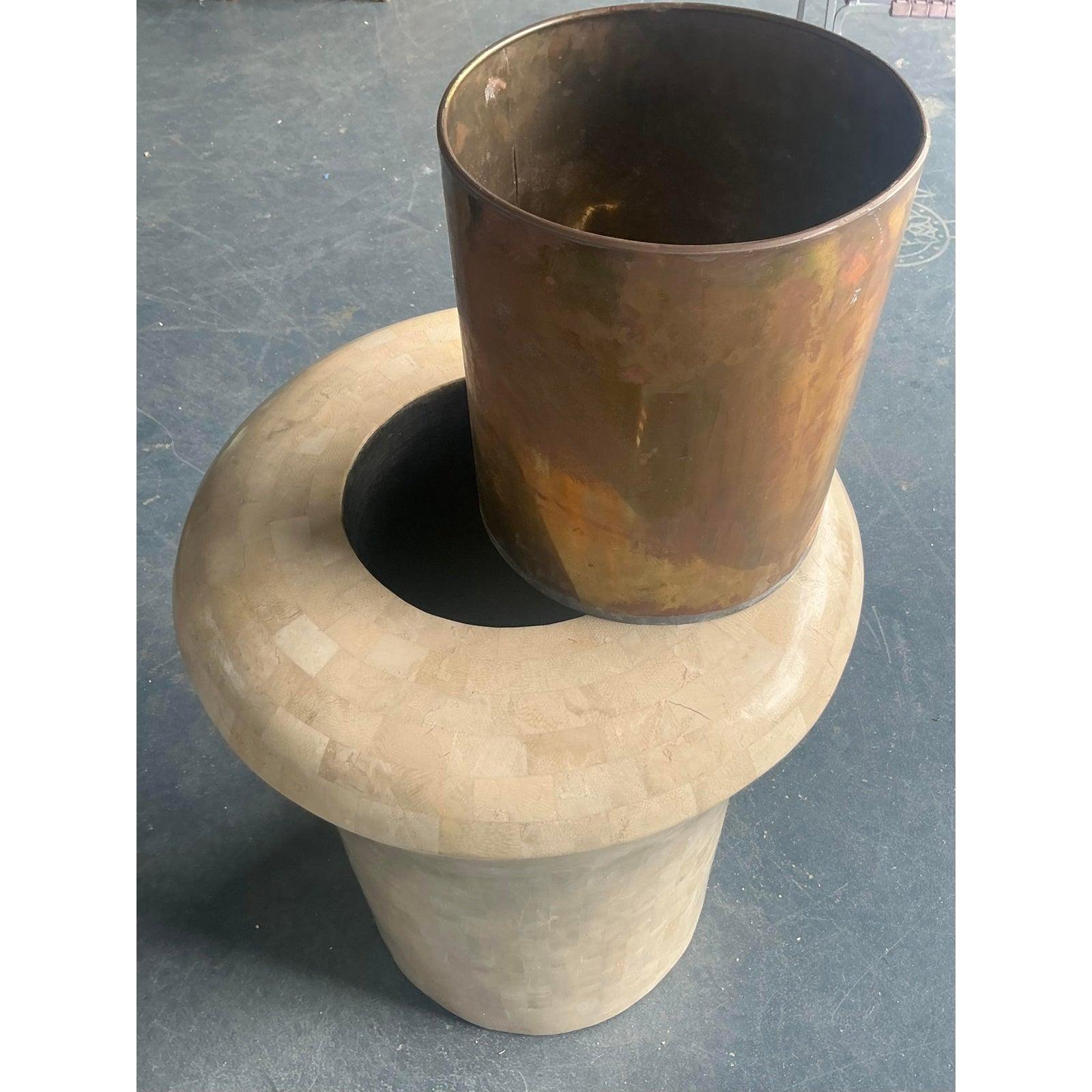 Make a bold, sculptural statement with this monumental vintage urn planter by the renowned Maitland-Smith. Masterfully crafted, the entire surface is hand-clad in tessellated fossil stone, showcasing a beautiful mosaic of creamy, organic tones and