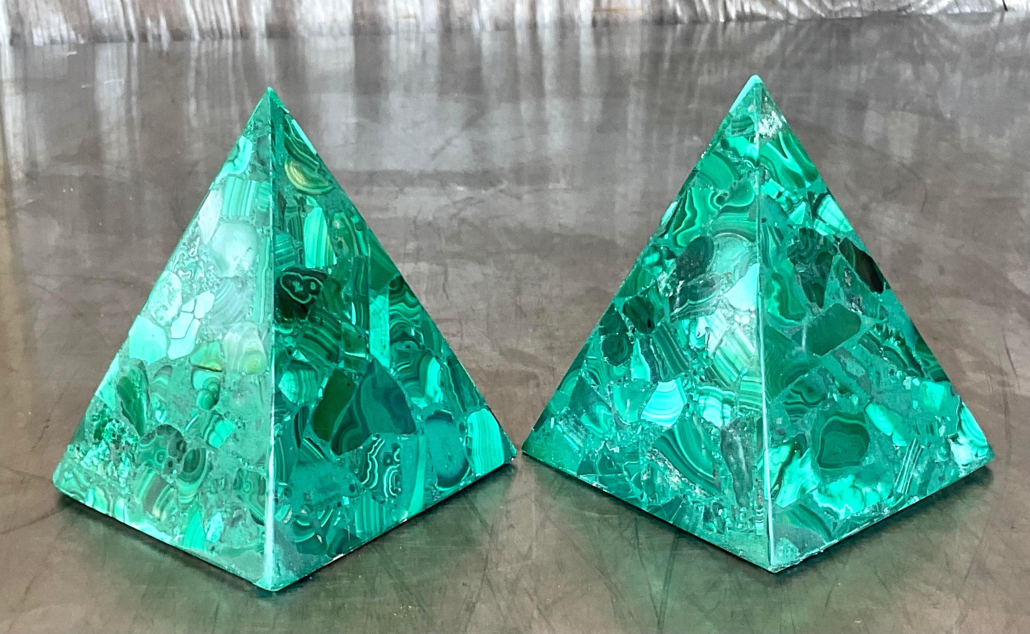 A striking pair of vintage Pyramids. A chic Malachite malachite over wood construction. Perfect to add a flash of glamour to any space. Acquired from a Palm Beach estate.
