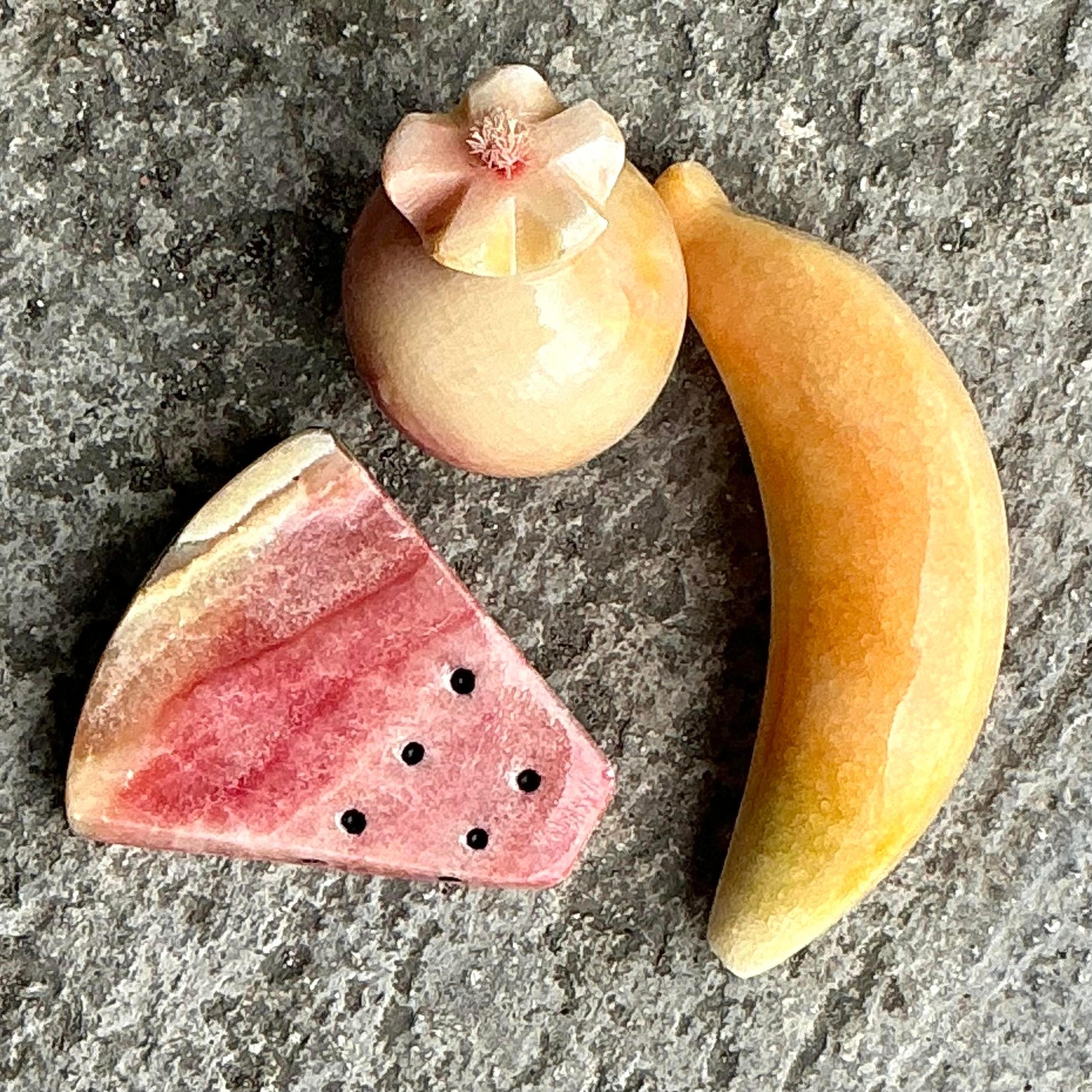 Add a touch of natural elegance with this Vintage Boho Marble Fruit Set of 3. Each piece features unique veining and a polished finish, perfect for a chic, bohemian-inspired display.