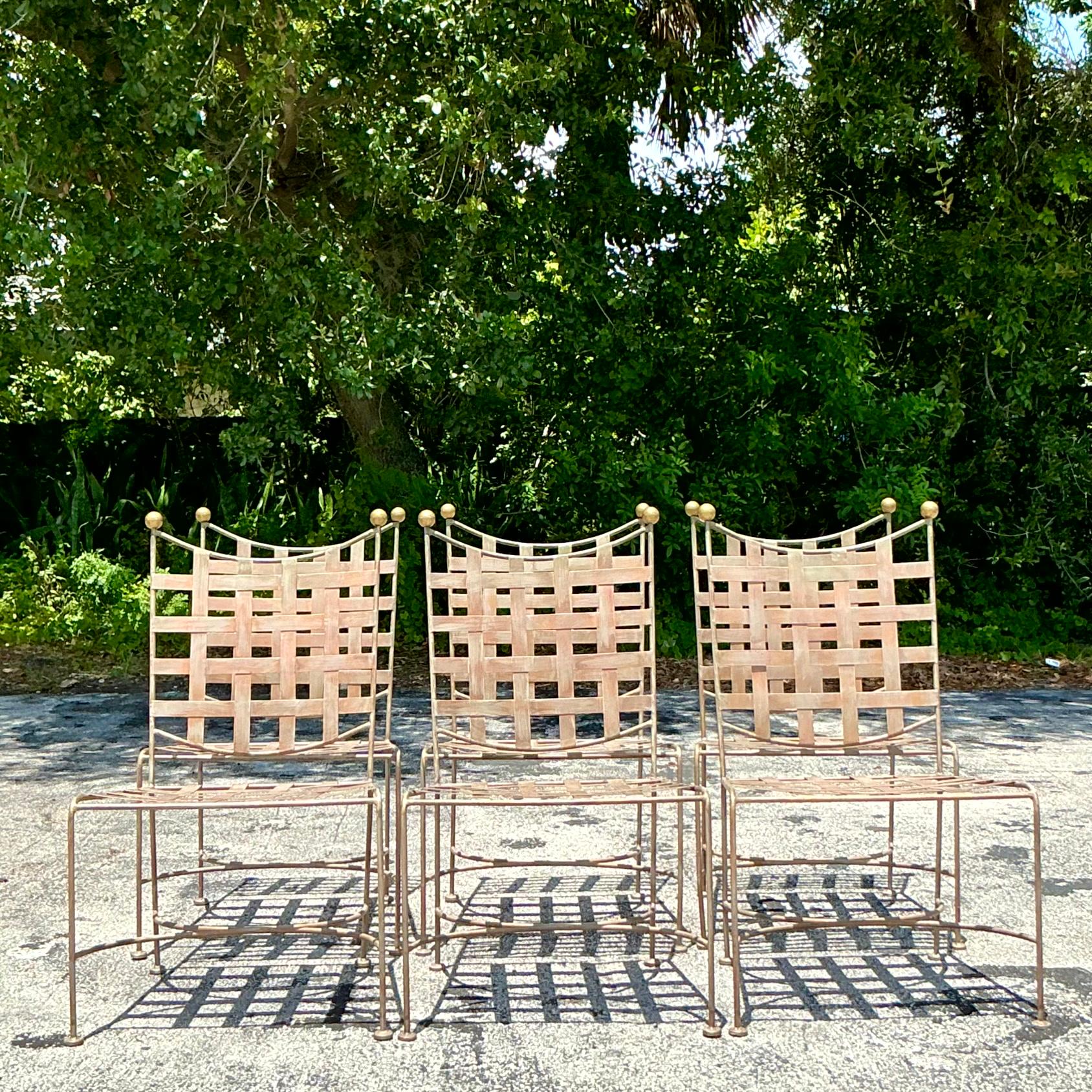 Elevate your outdoor dining experience with this set of six Vintage Boho Mario Papperzini Style Banded Outdoor Dining Chairs. Combining American style with Papperzini's signature flair, these chairs feature elegant banded detailing and sturdy