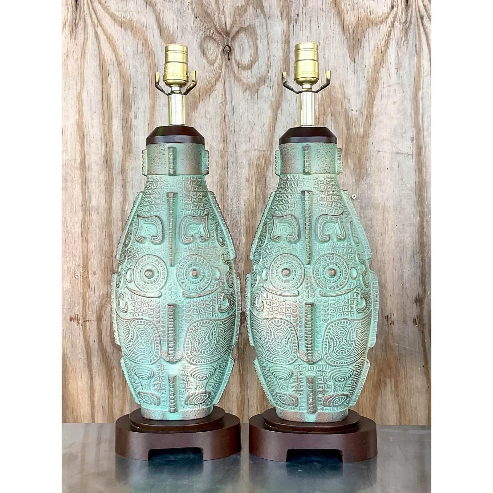 Fantastic pair of vintage Boho lamps. Beautiful matte ceramic finish with light gilt detailing. Chic Aztec inspired design. Acquired from a Palm Beach estate.