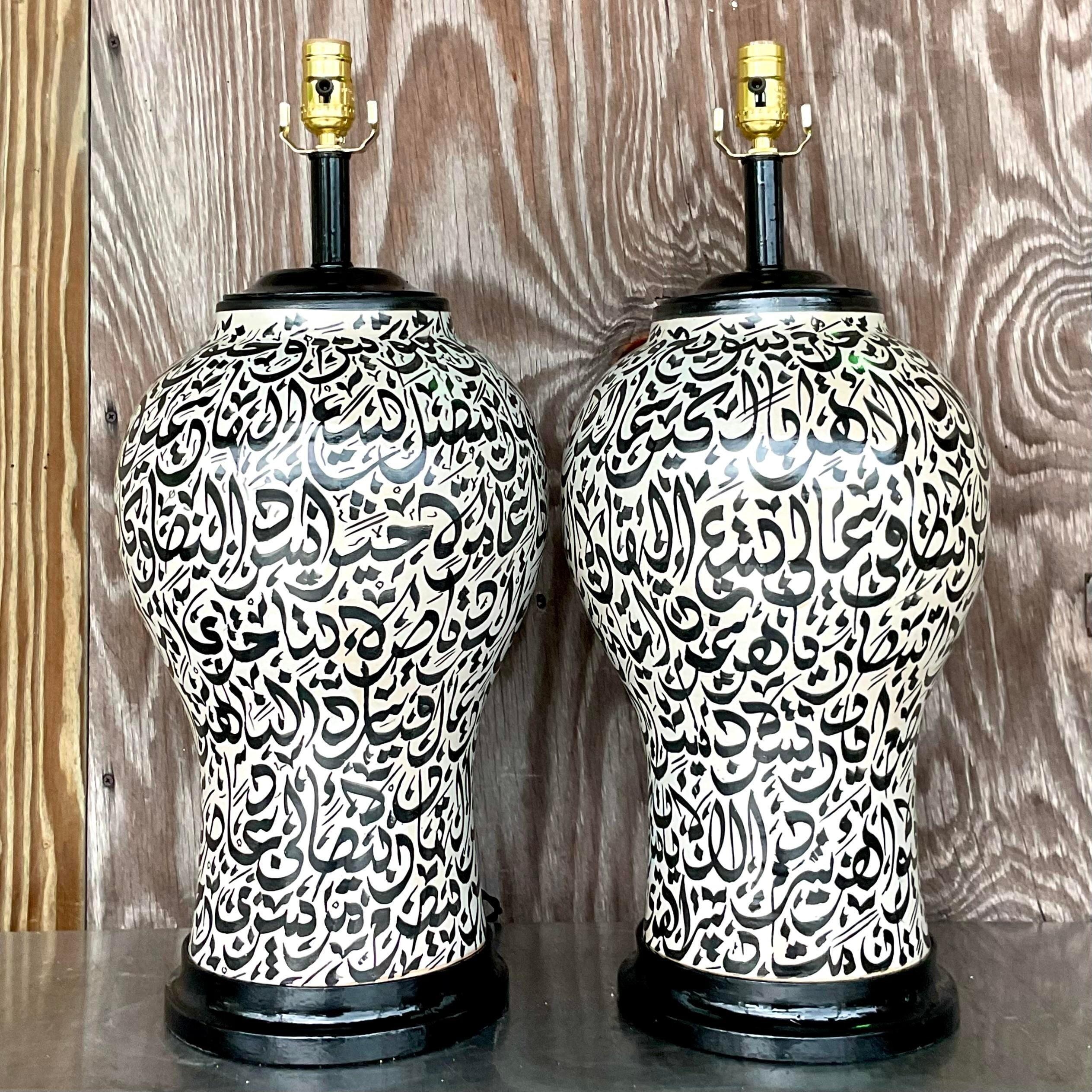 A fantastic pair of vintage Boho table lamps. A chic graphic design with a matte glazed finish. Fully restored with all new hardware, wiring and plinths. Acquired from a Palm Beach estate.