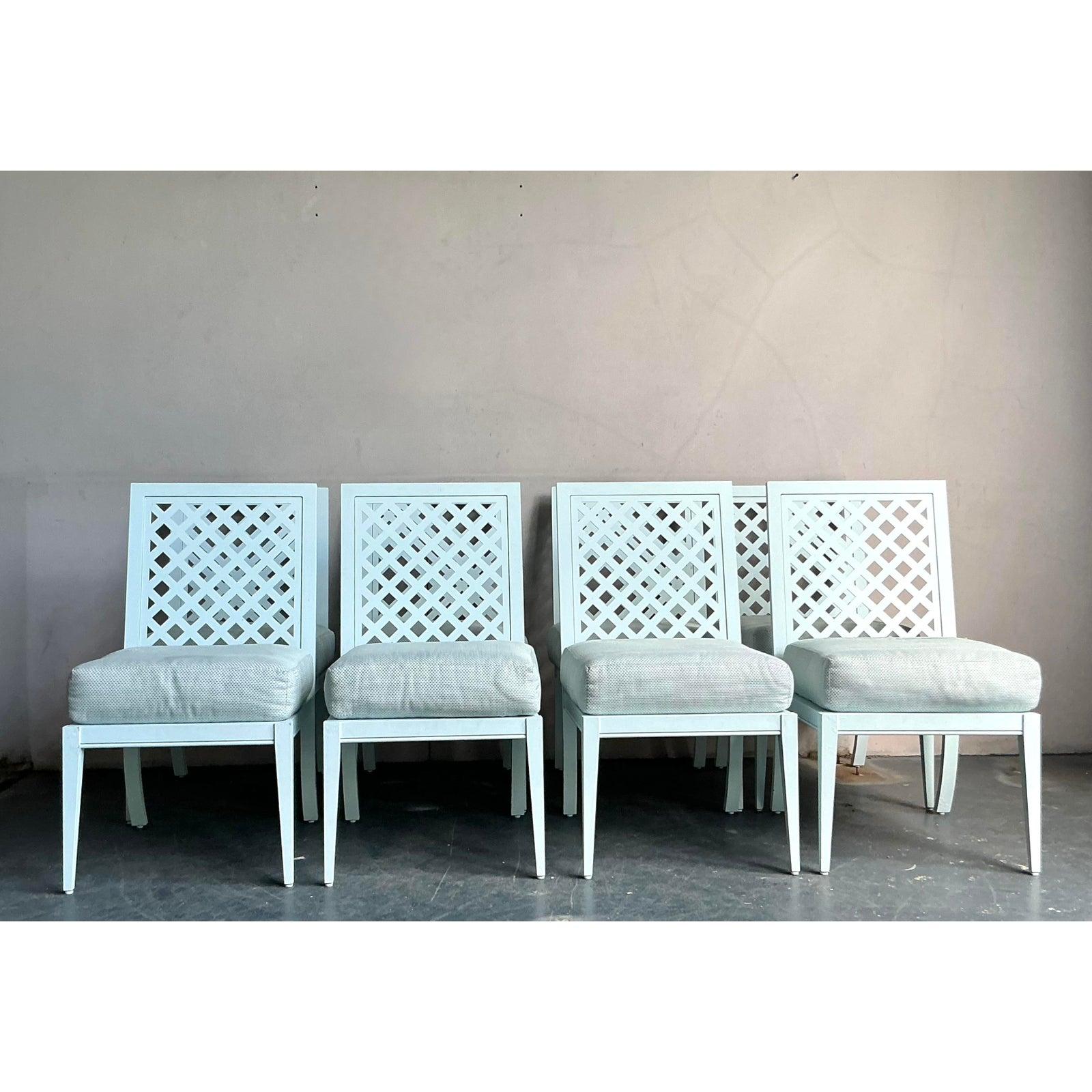 Elevate your dining experience with this stunning set of eight vintage chairs from the esteemed American maker, McKinnon and Harris. Renowned for their exceptional craftsmanship and all-weather durability, these chairs are constructed from robust