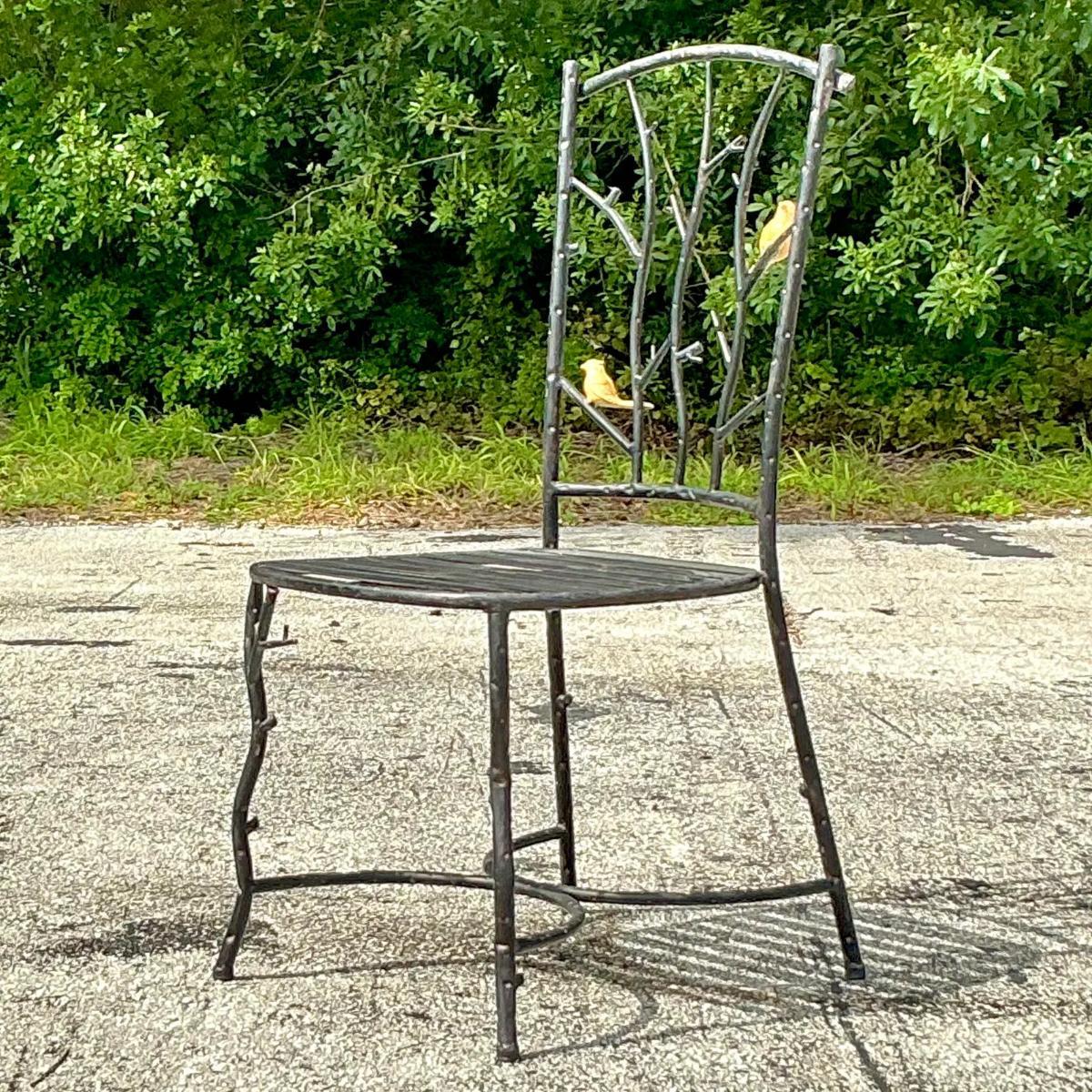 Add a touch of artistic flair to your décor with this Vintage Boho Metal Faux Bois Chair. Crafted to mimic the organic look of tree branches, the metal frame features intricate faux bois detailing, capturing the natural beauty of wood with the