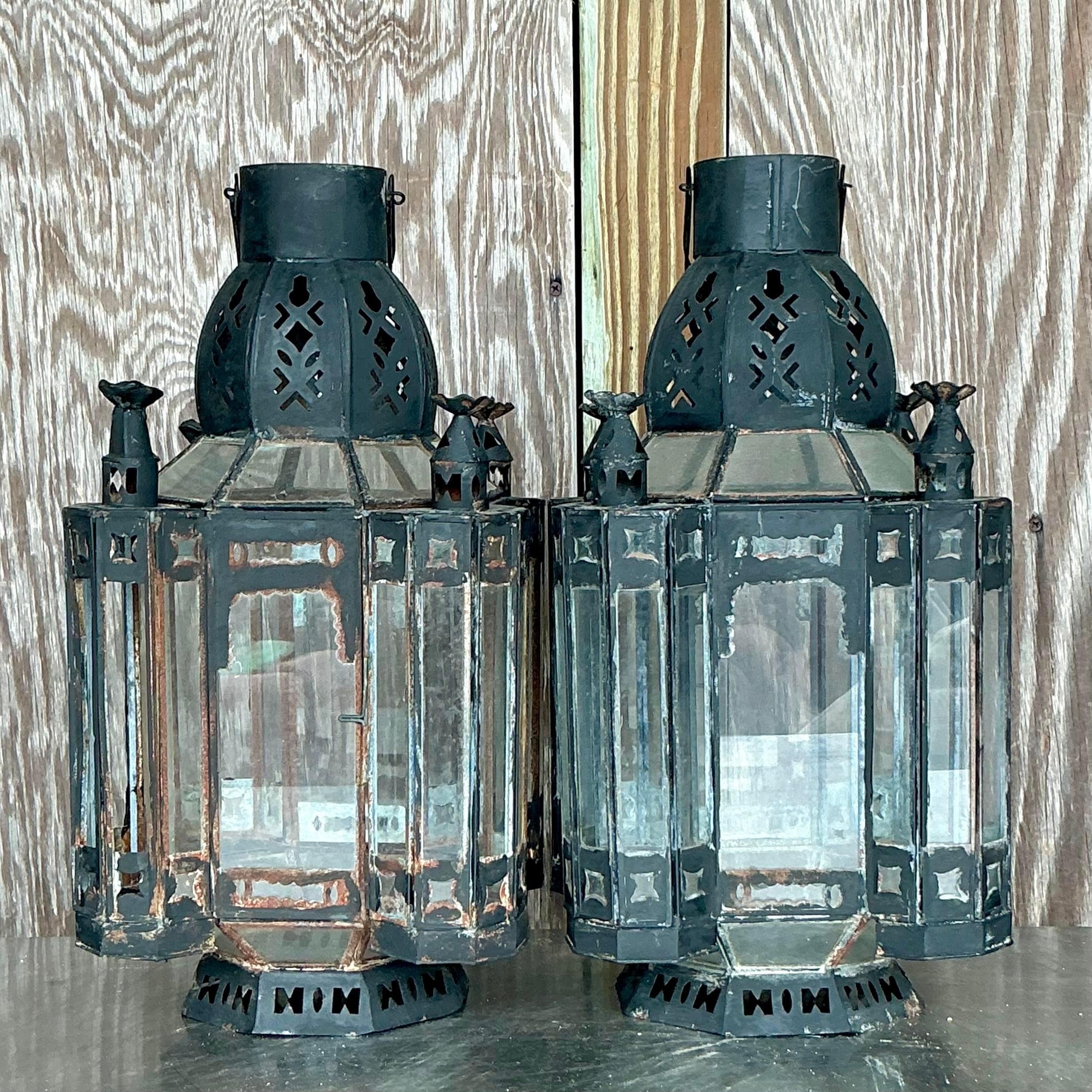 Illuminate your space with the enchanting charm of Vintage Boho Moroccan Lanterns. Featuring intricate patterns and colorful glass accents, these lanterns add a touch of bohemian elegance and exotic allure to any room. Perfect for creating a warm,