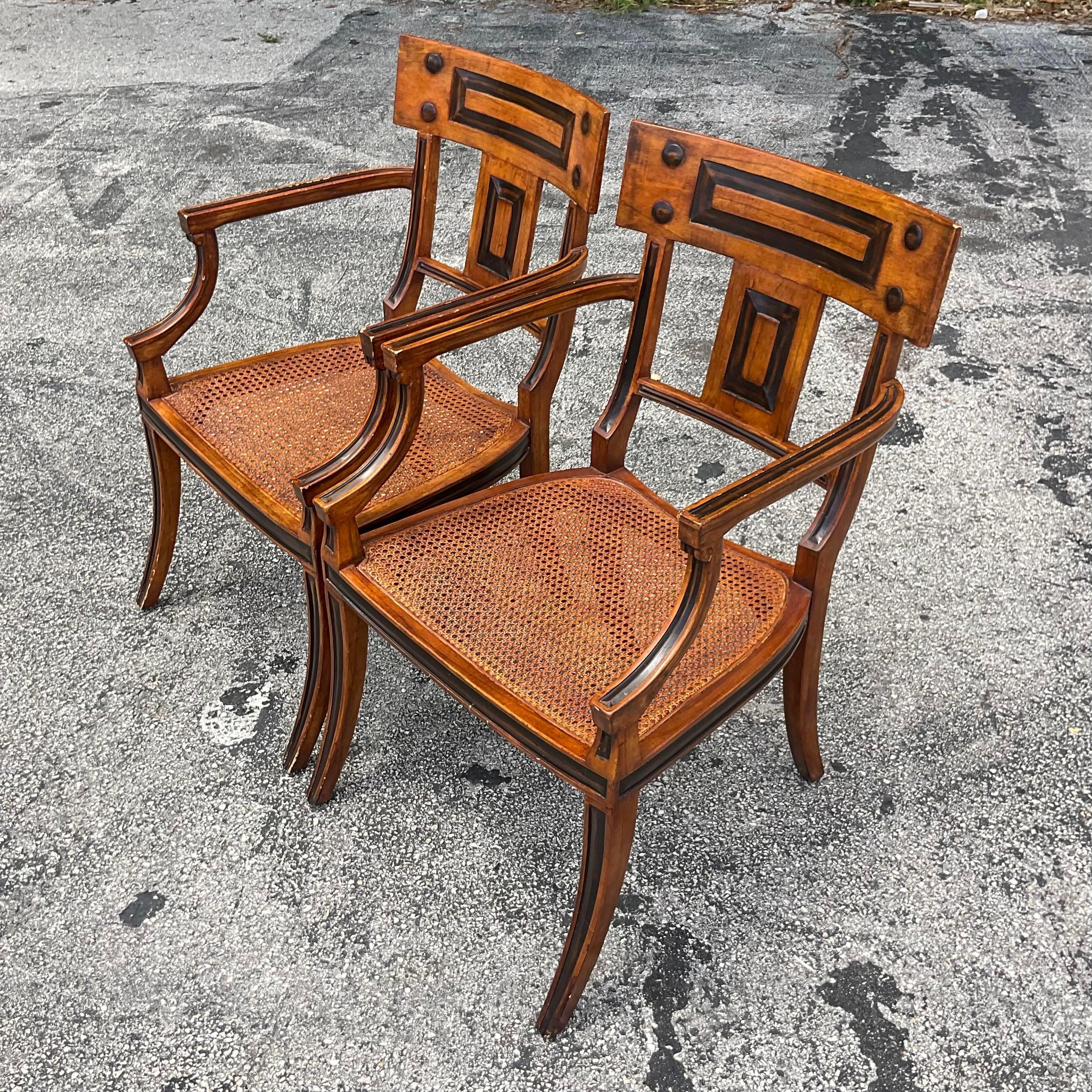 Infuse your space with timeless design using this pair of vintage Boho Michael Taylor for Baker Klismos chairs. American-crafted with iconic style, these chairs blend mid-century charm with Bohemian flair, offering both comfort and sophistication to