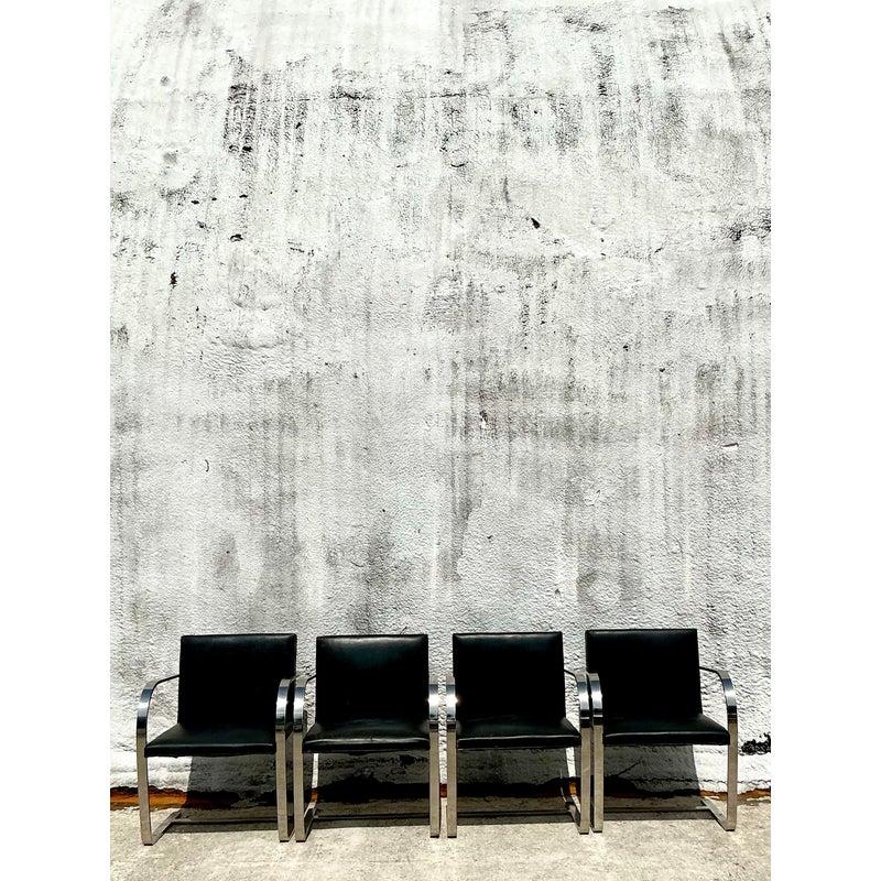 Elevate your interior with an authentic piece of design history: this iconic pair of vintage BRNO chairs, originally conceived by the legendary Mies van der Rohe and produced by Knoll International. Their signature flat-bar cantilevered chrome