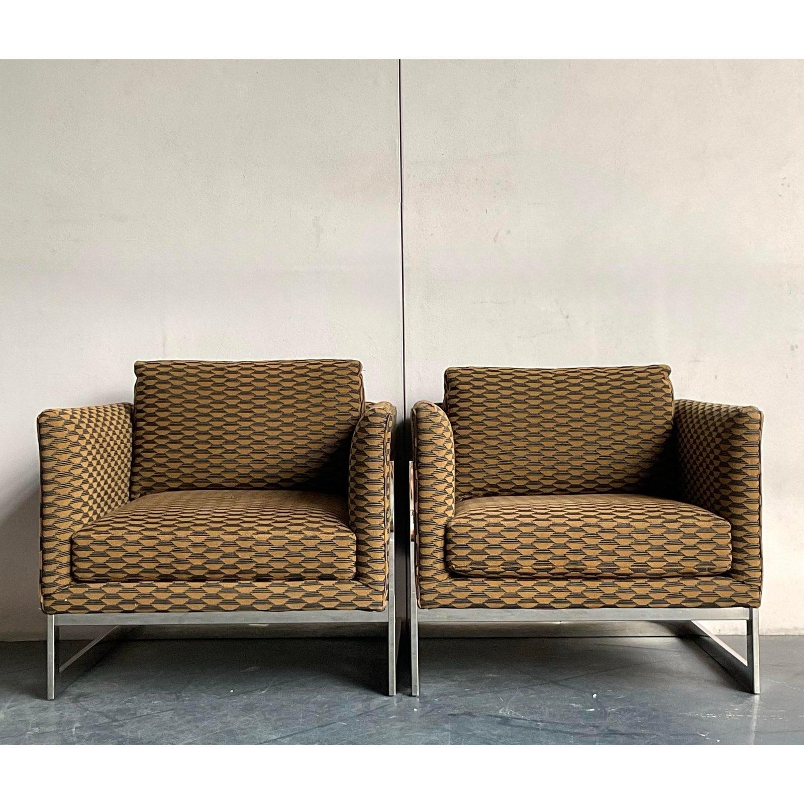 Immerse your space in iconic design with this distinguished pair of vintage T-Back lounge chairs, attributed to the celebrated Milo Baughman for Thayer Coggin. These chairs exemplify a sophisticated blend of Mid-Century Modern lines and a touch of