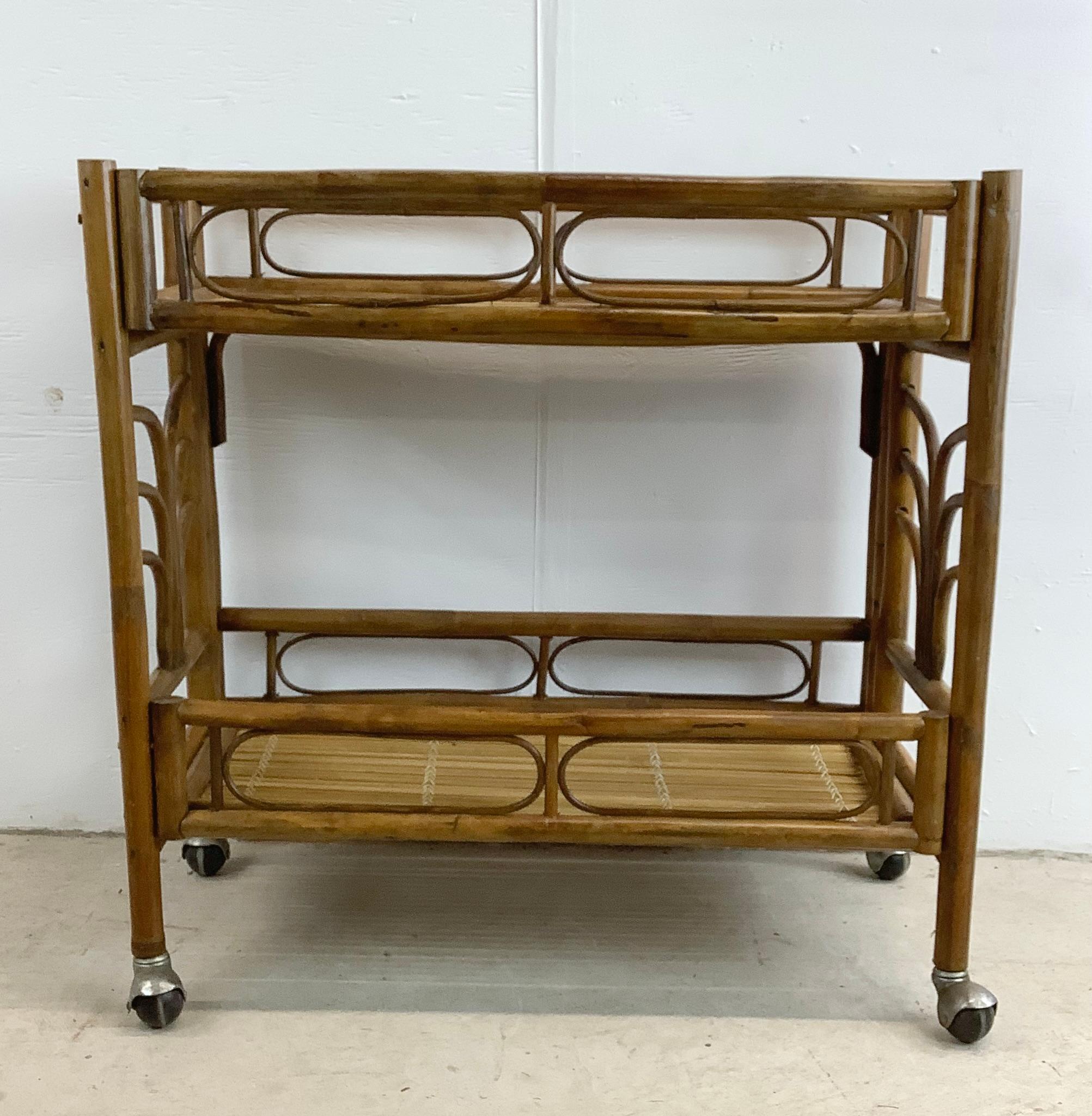 This Vintage Bamboo Bar Car makes a stylish mid-century style piece that adds a touch of elegance and functionality to your home, this remarkable bar cart is a true vintage gem.

Crafted with an eye-catching boho modern style, the bamboo
