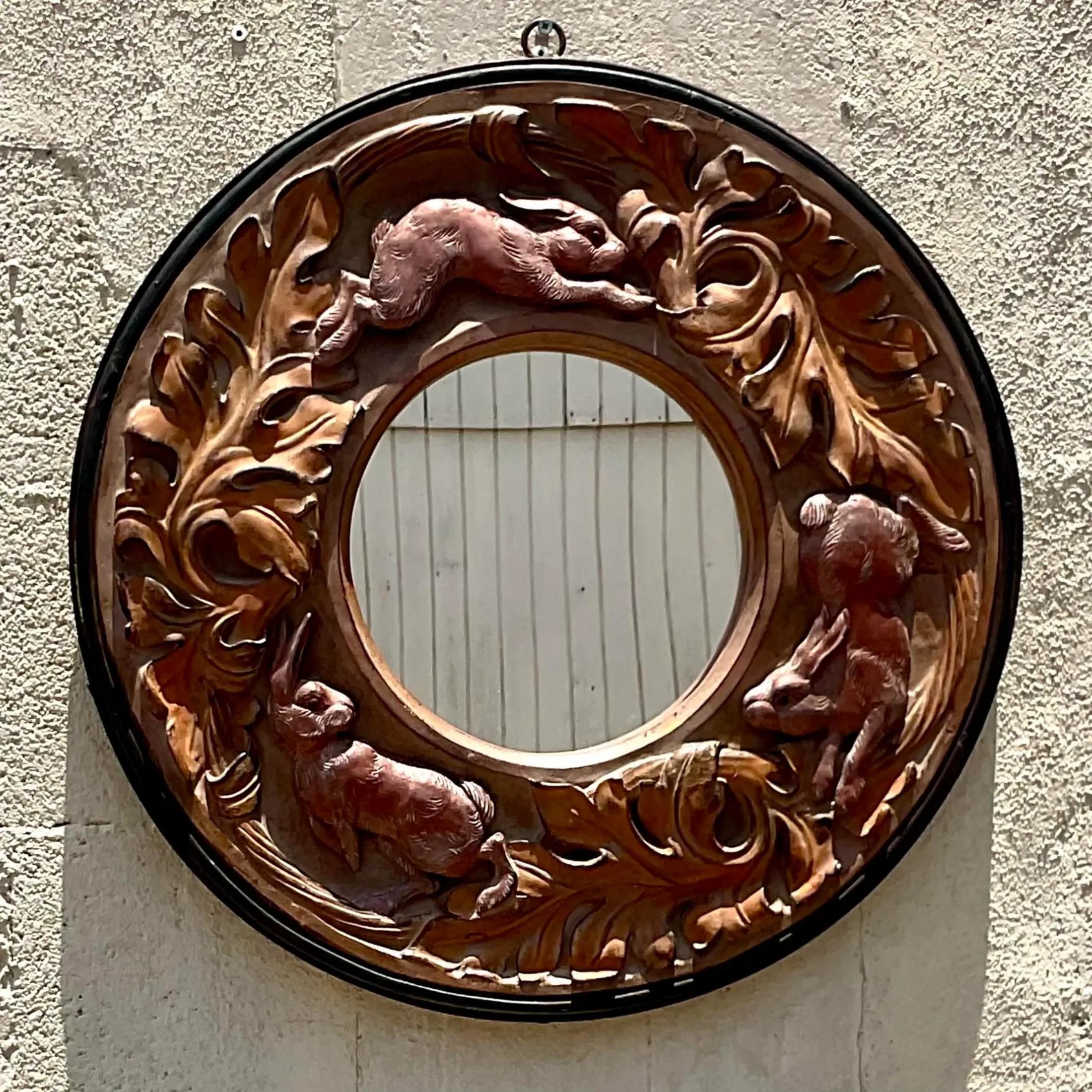 A fabulous vintage Boho wall mirror. A chic molded resin with charming rabbits and leaves. A great patinated finish. Acquired from a Palm Beach estate