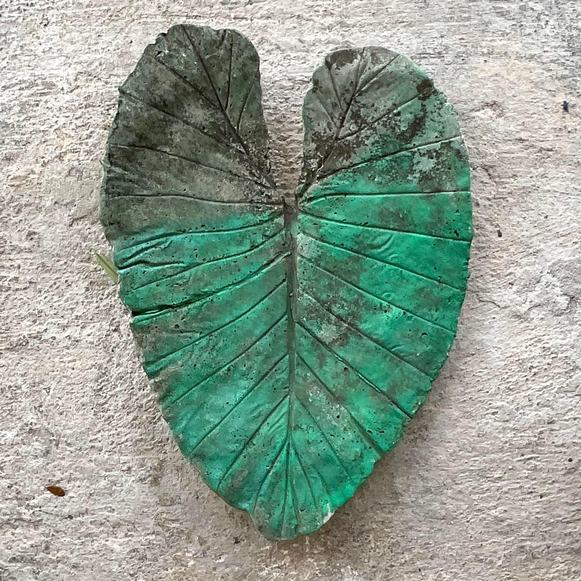 A stunning vintage Boho Elephant Ear leaf. Made in a heavy cast concrete and hand painted a Kelly bright green. Makes a fabulous centerpiece on your outdoor table or a chic garden ornament. Acquired from a Palm Beach estate.