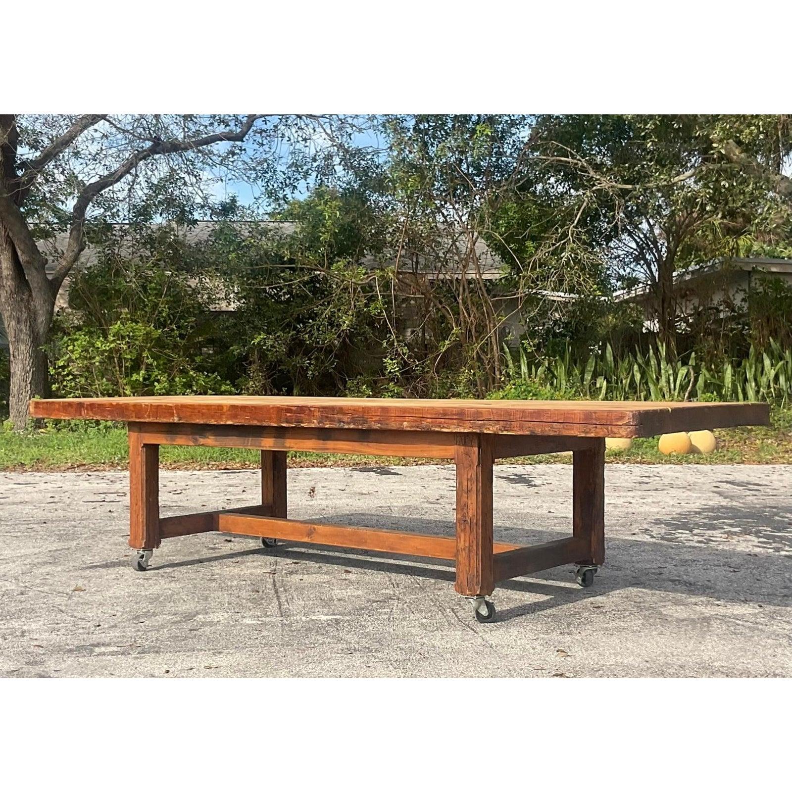 Vintage Boho Monumental Industrial Plank Dining Table on Casters In Good Condition For Sale In West Palm Beach, FL