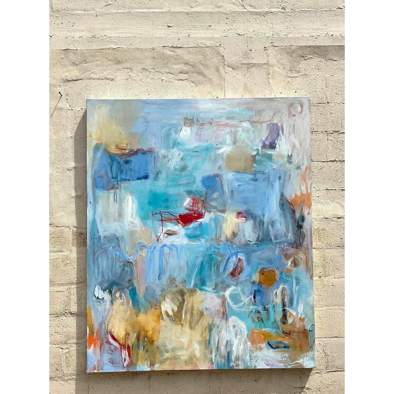 D'une échelle audacieuse et d'une composition à couper le souffle, cette peinture à l'huile abstraite vintage unique en son genre fait une déclaration inoubliable dans n'importe quel intérieur. Avec un lavis éthéré de bleus, de crèmes, d'ocres et de