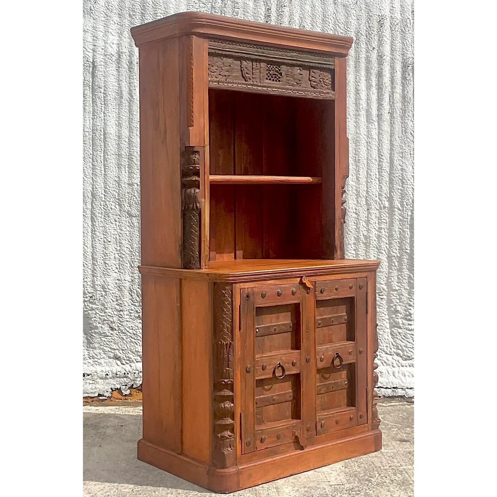 hand carved storage cabinet