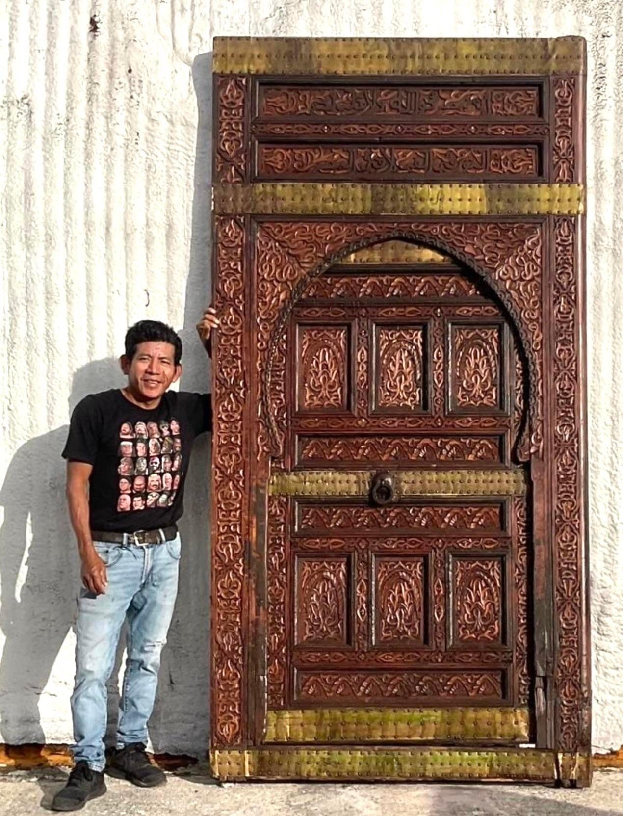Mid-Century Modern Vintage Boho Moroccan Carved Wooden Door With Brass Detail For Sale