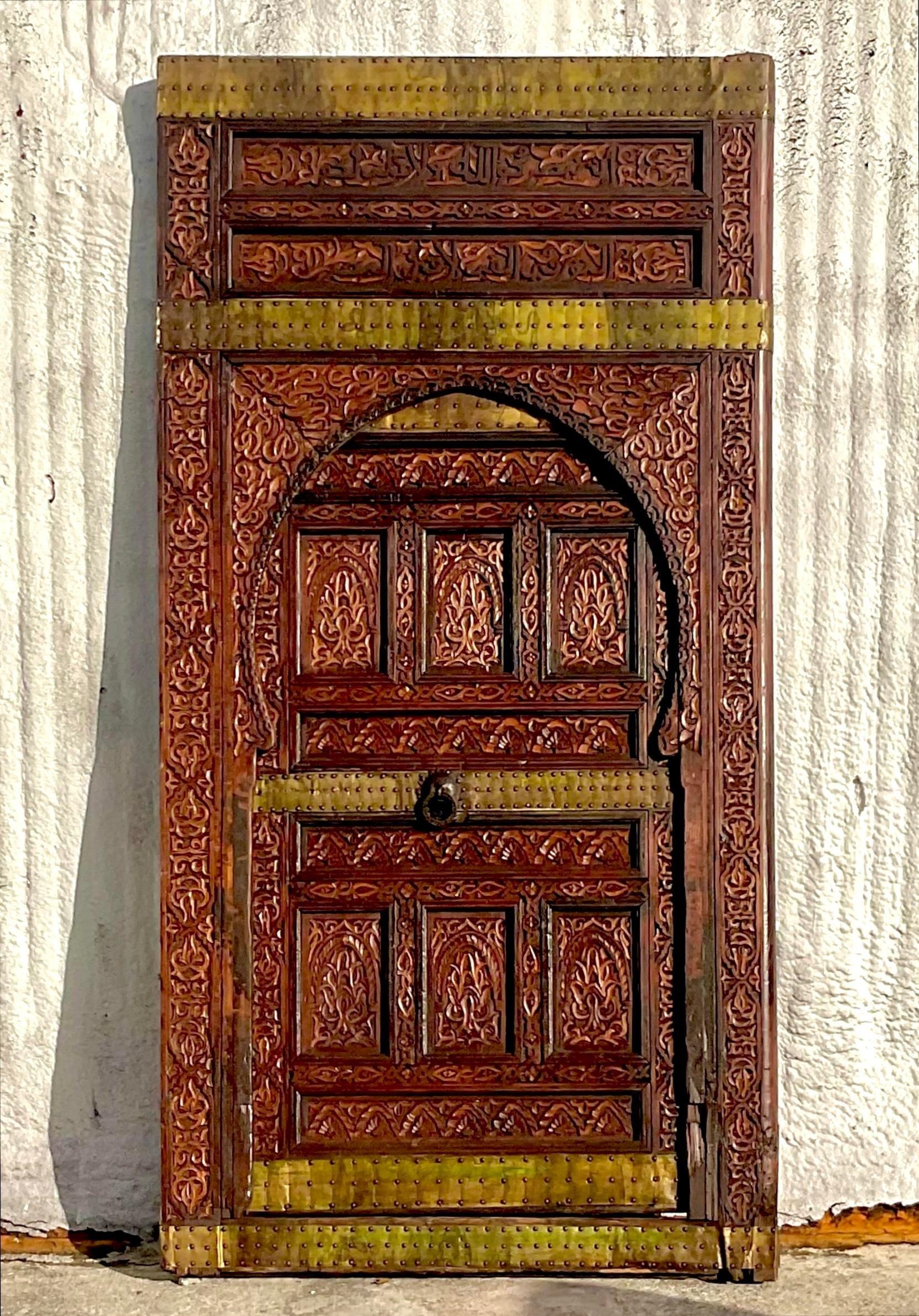 Vintage Boho Moroccan Carved Wooden Door With Brass Detail In Good Condition For Sale In west palm beach, FL