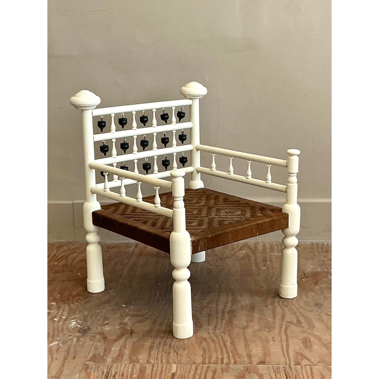 Rush Vintage Boho Moroccan Dangling Bobbin Chair For Sale