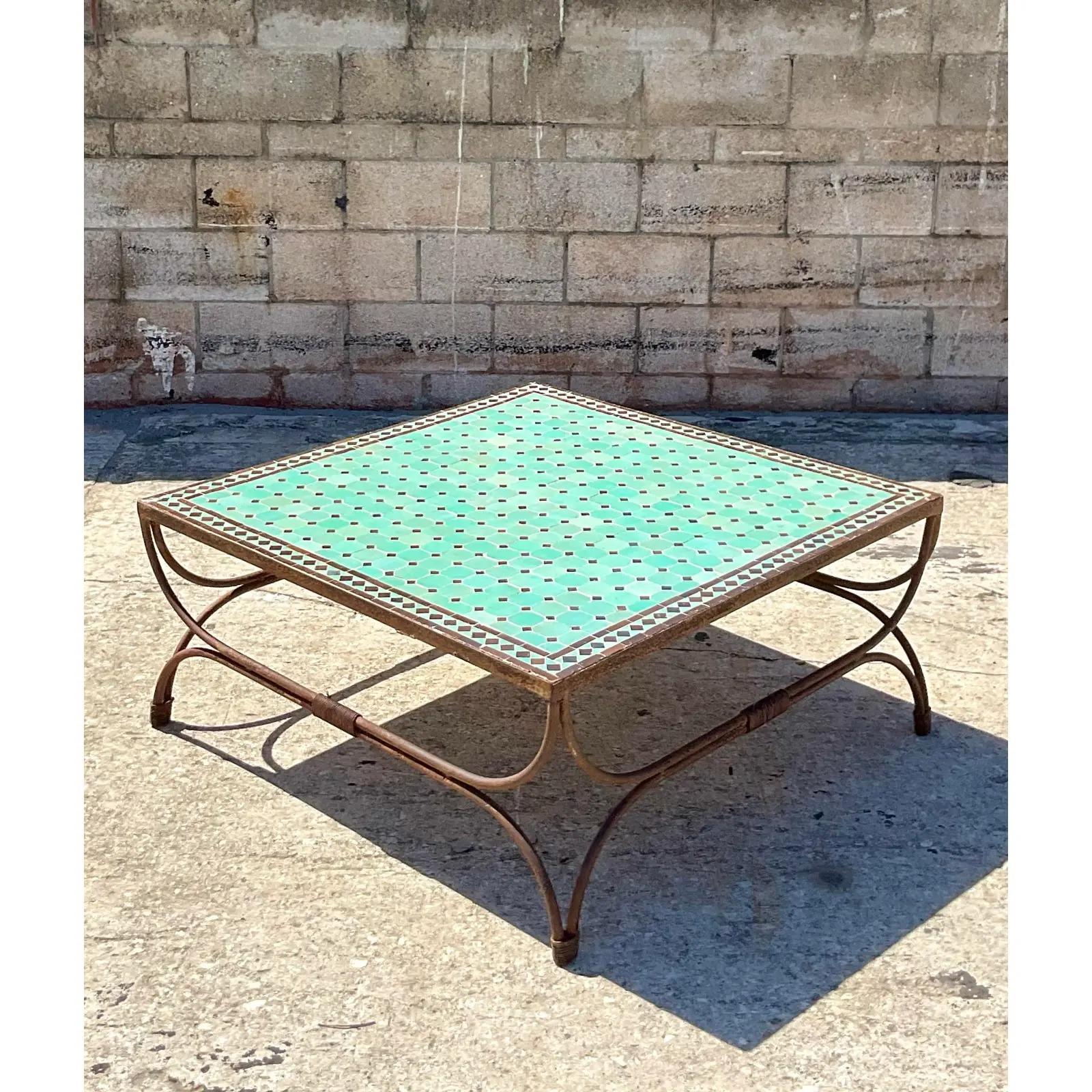 Fantastic vintage tile coffee table. Gorgeous green tiles with a chic distressed frame. Amazing dramatic look. Acquired from a Palm Beach estate.